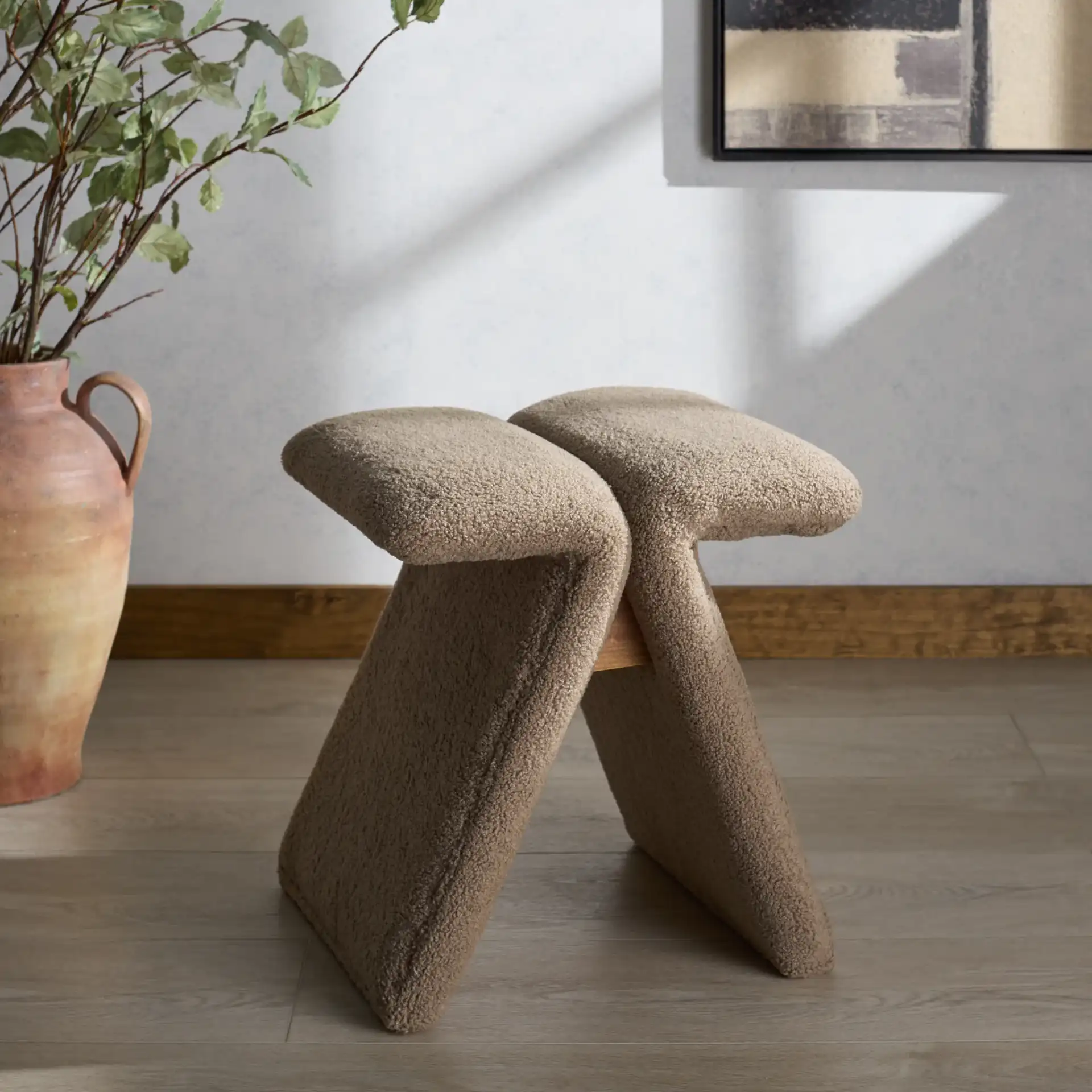 Tessabella Teddy Fabric Ottoman in Dark Brown in a styled room