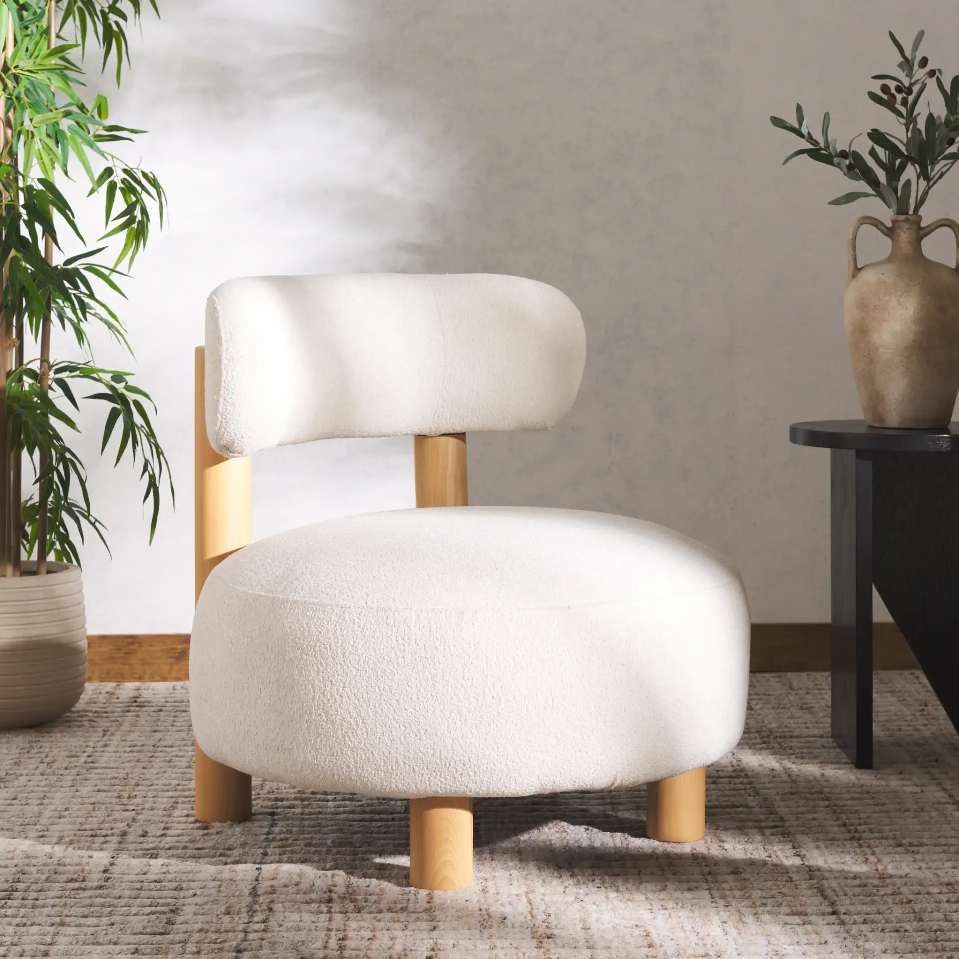 Eduardo Boucle Accent Chair in Ivory / Natural in a styled room