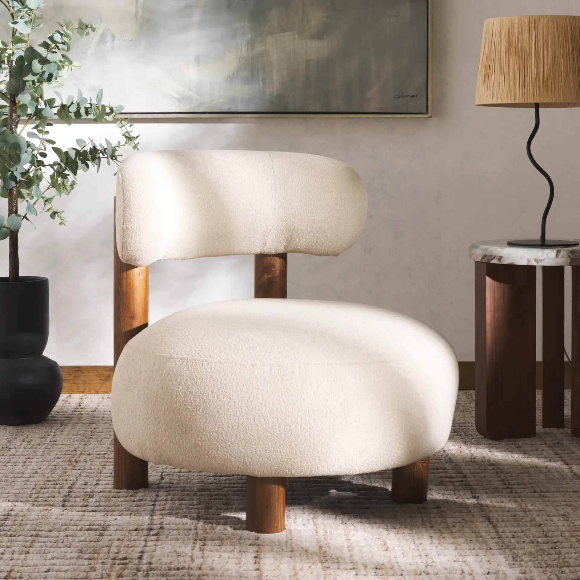 Eduardo Boucle Accent Chair in Tan / Walnut in a styled room