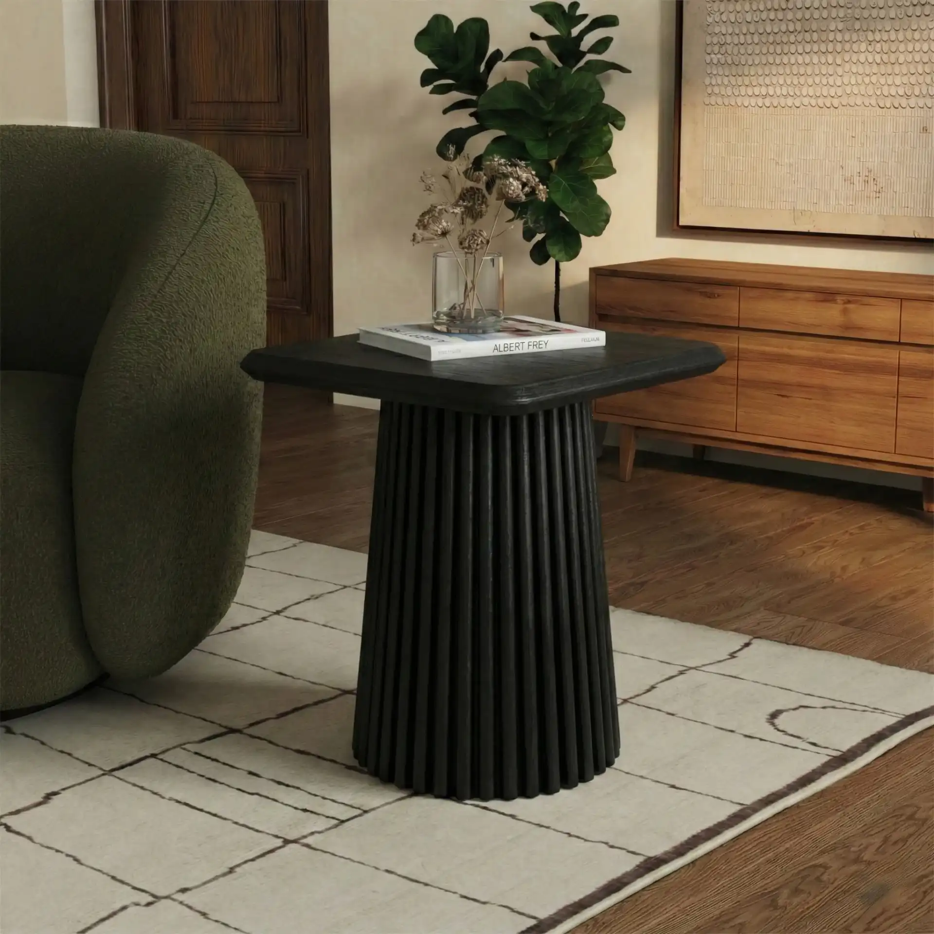 Penelope Wood Accent Table in Black in a styled room