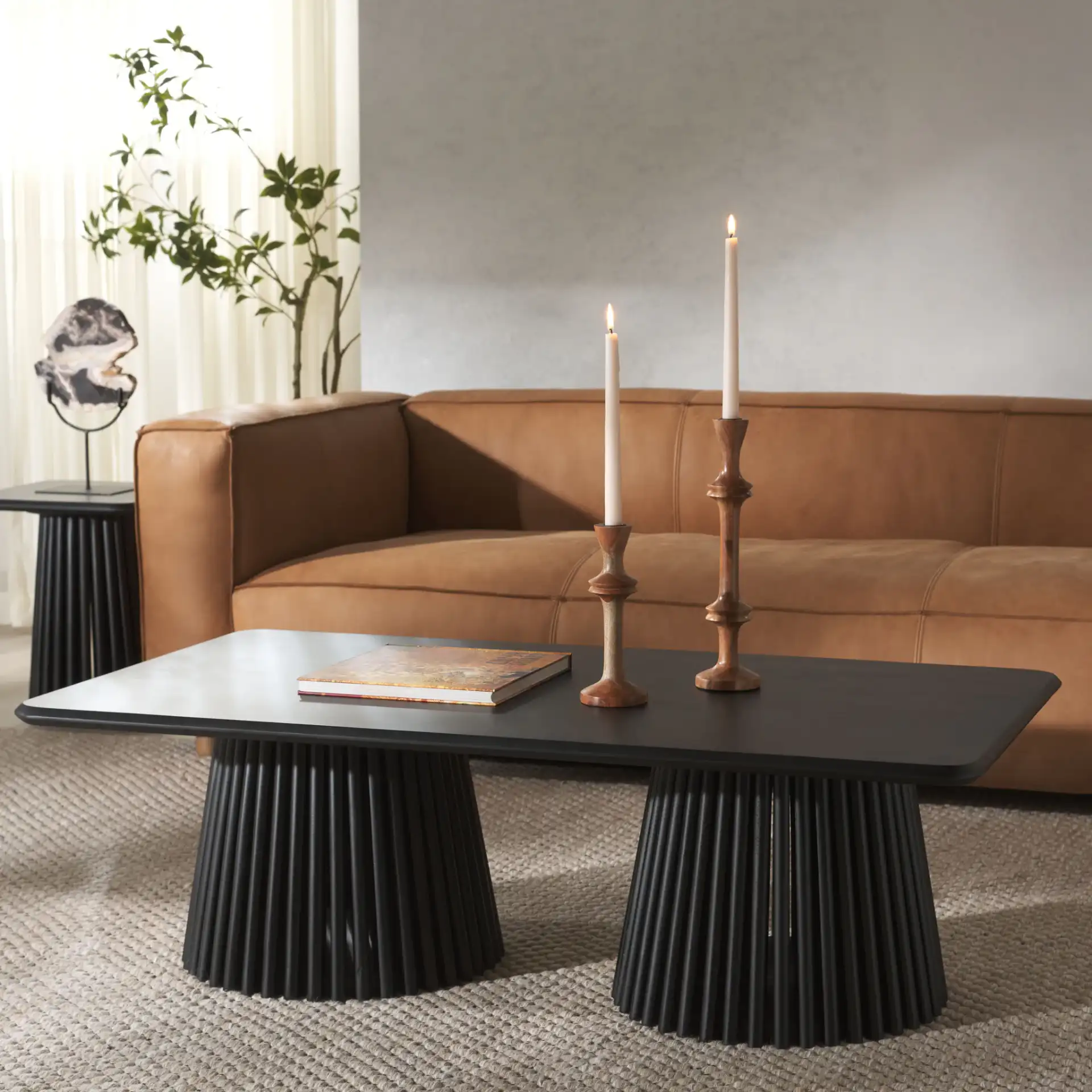 Penelope Wood Coffee Table in Natural in a styled room