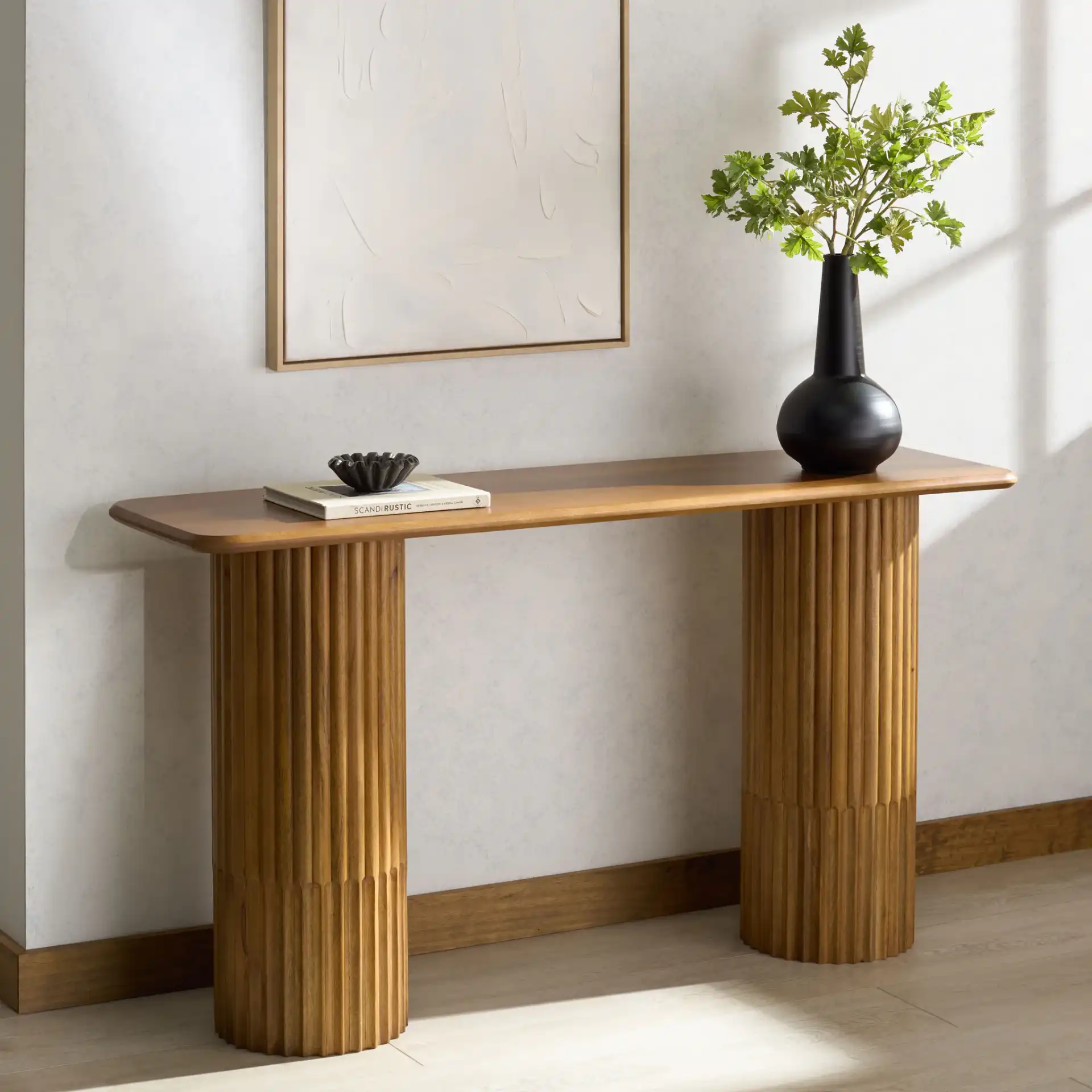 Treyshawn Console Table in Walnut in a styled room