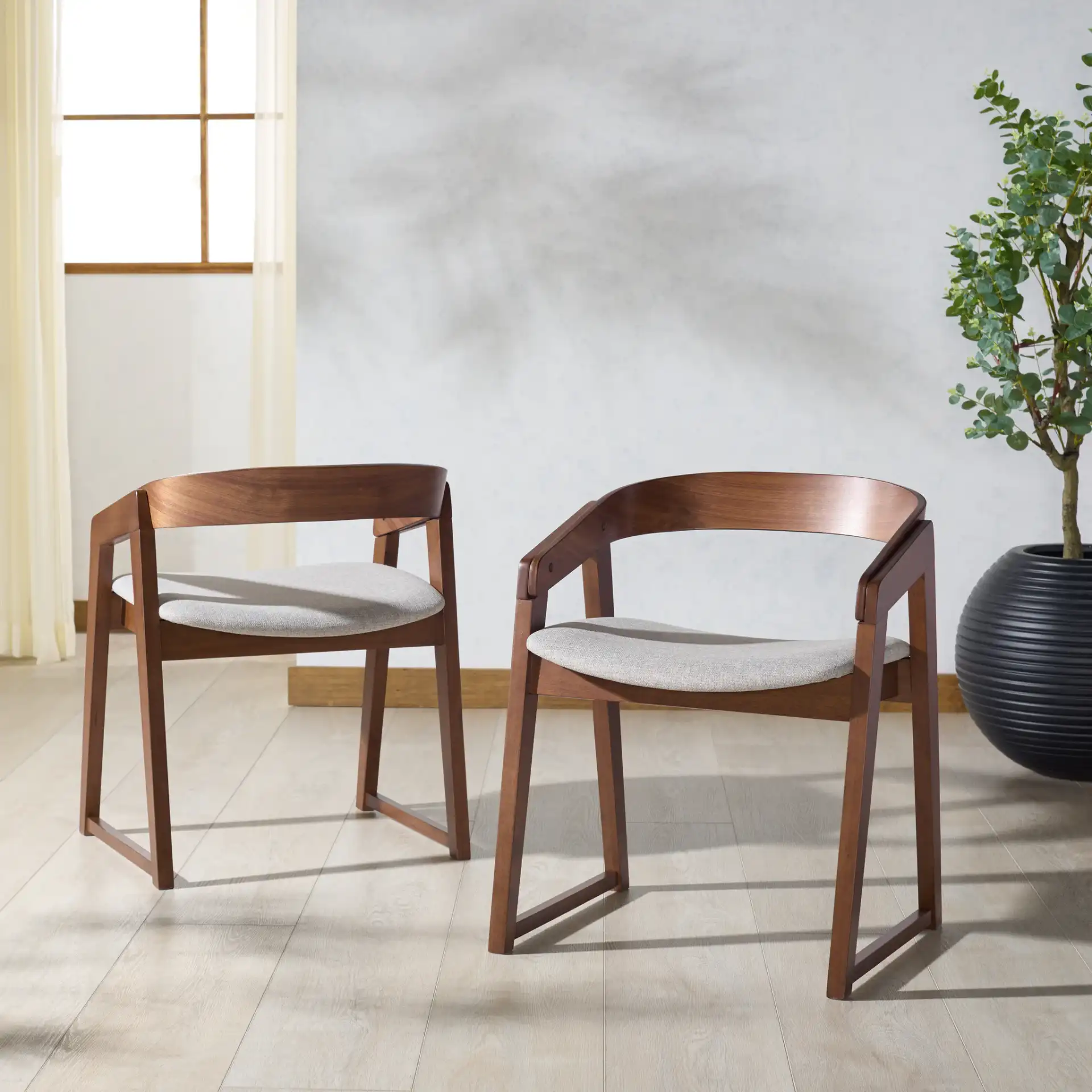 Hildabryna Wood Dining Chair (Set of 2) in Walnut / Light Gray in a styled room