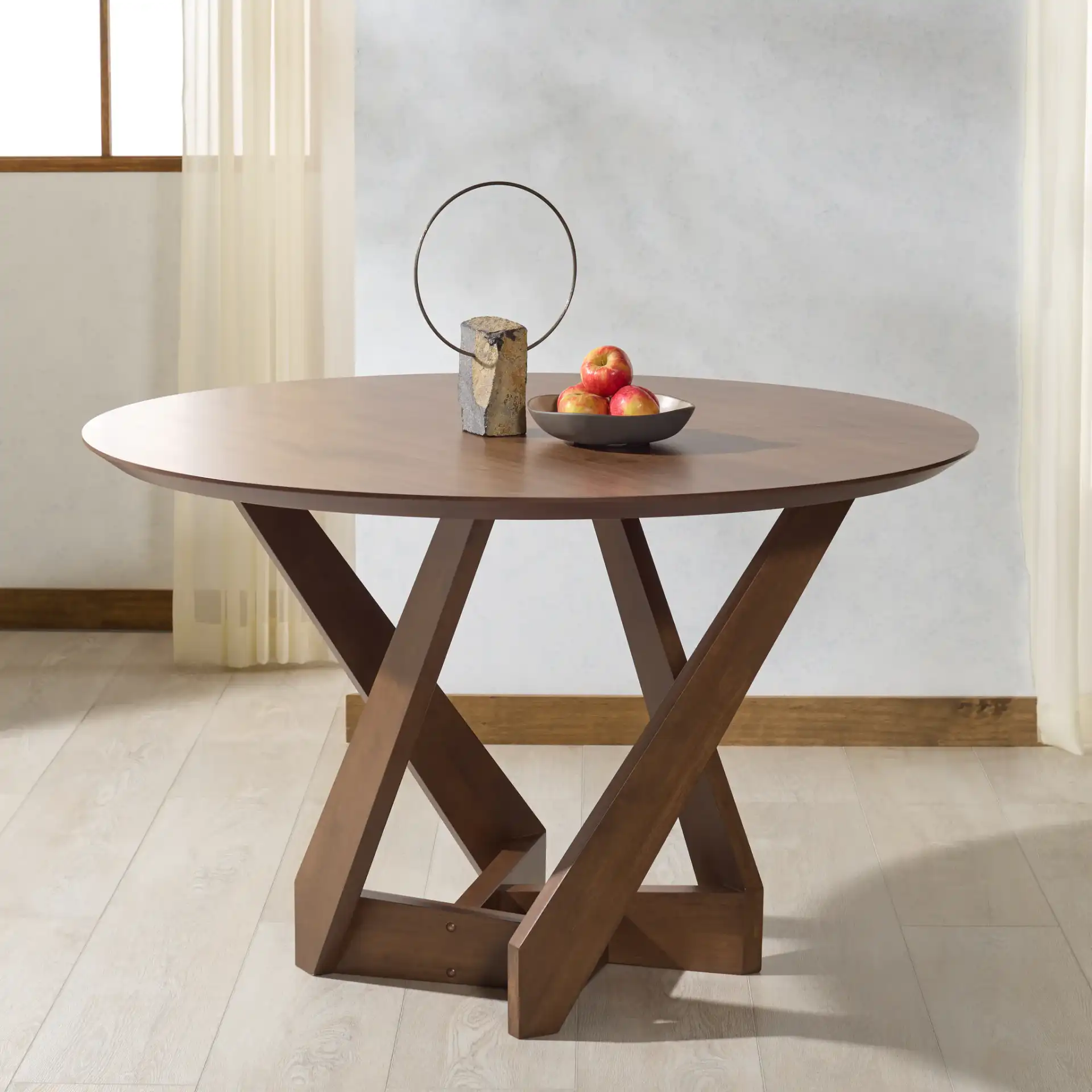 Hildabryna Round Wood Dining Table in Walnut in a styled room
