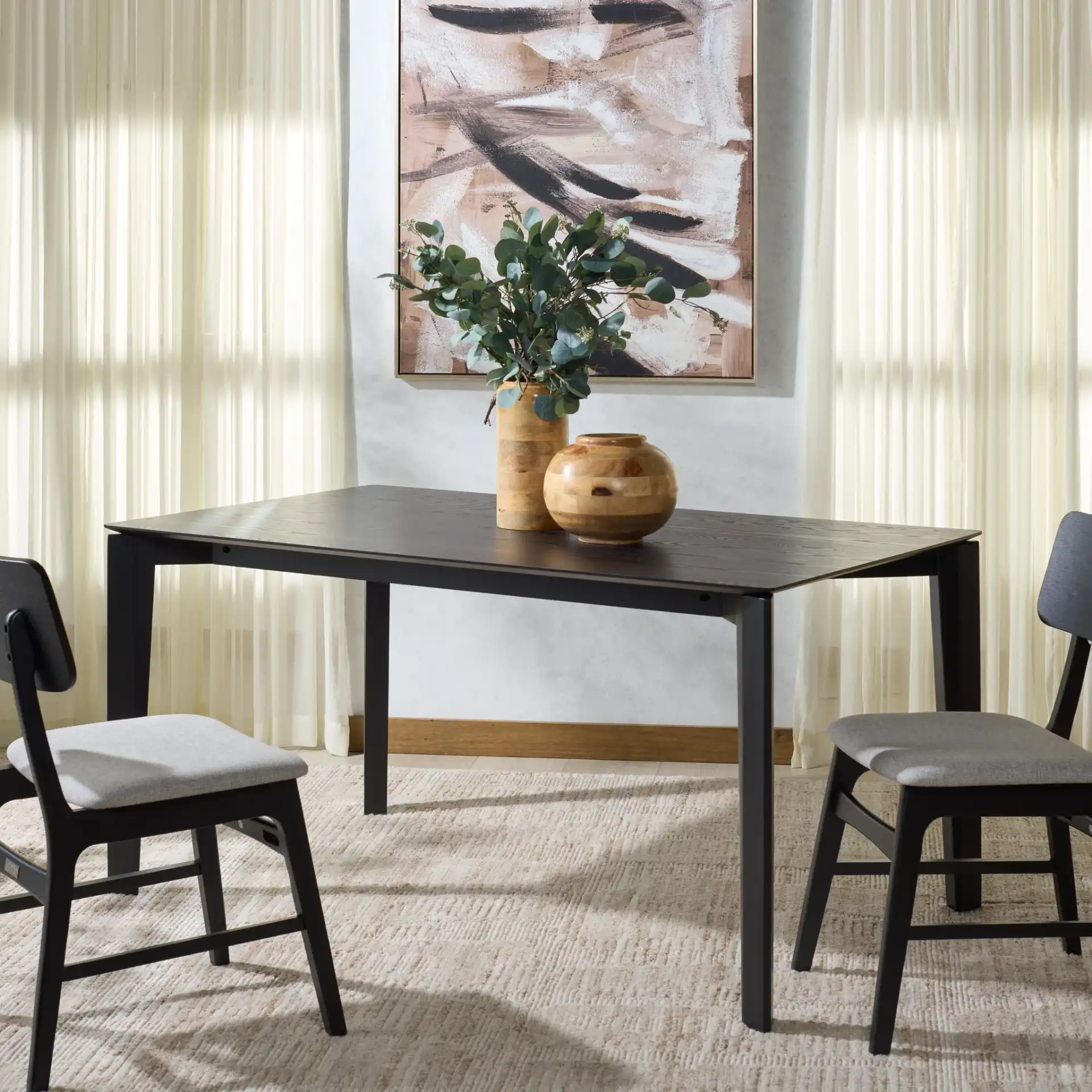 Alyssamarie Wood Dining Table in Black in a styled room