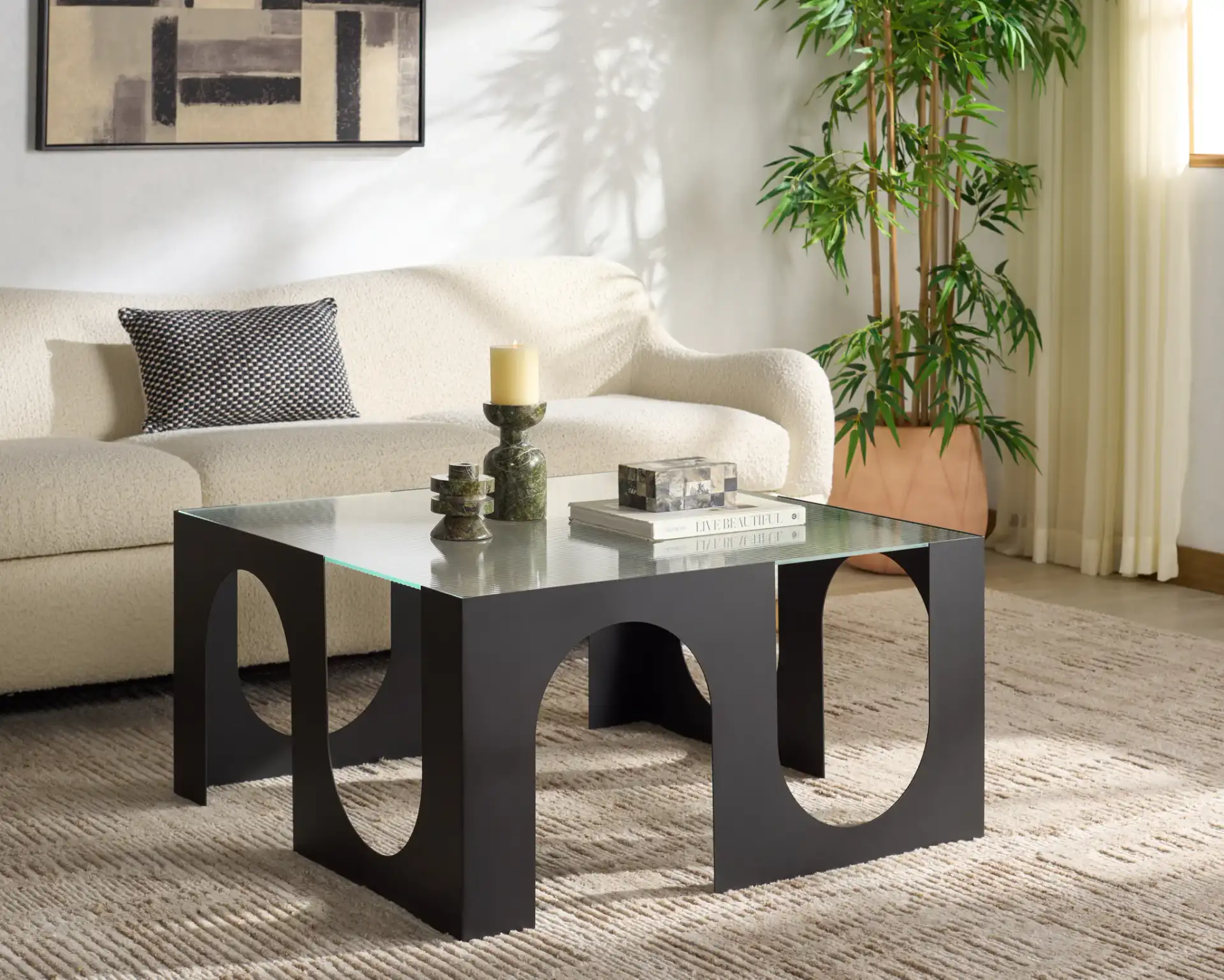 Brayberry Metal Coffee Table in Black / Clear in a styled room