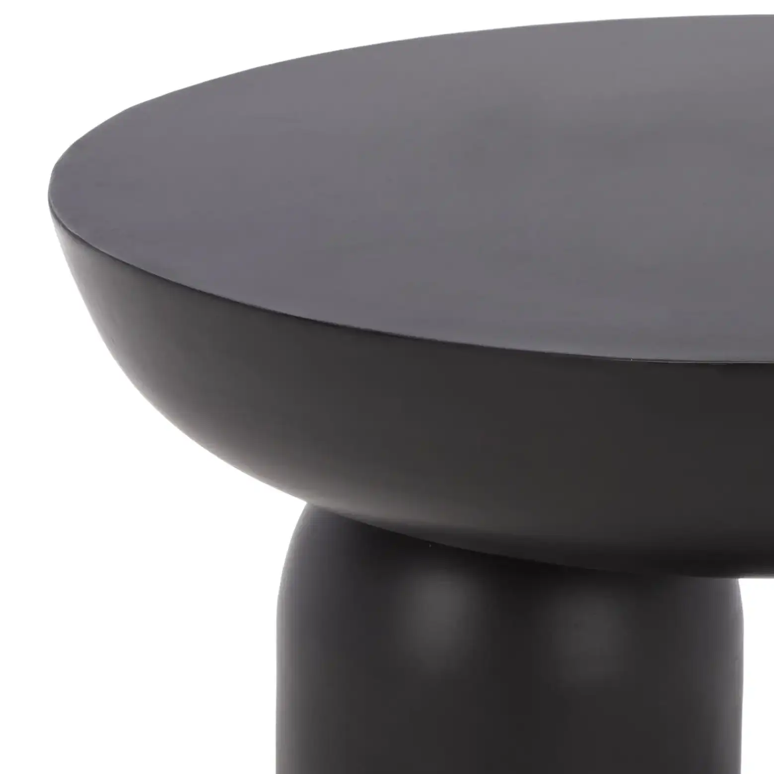 Donnastella Metal Accent Table in Black in a styled room