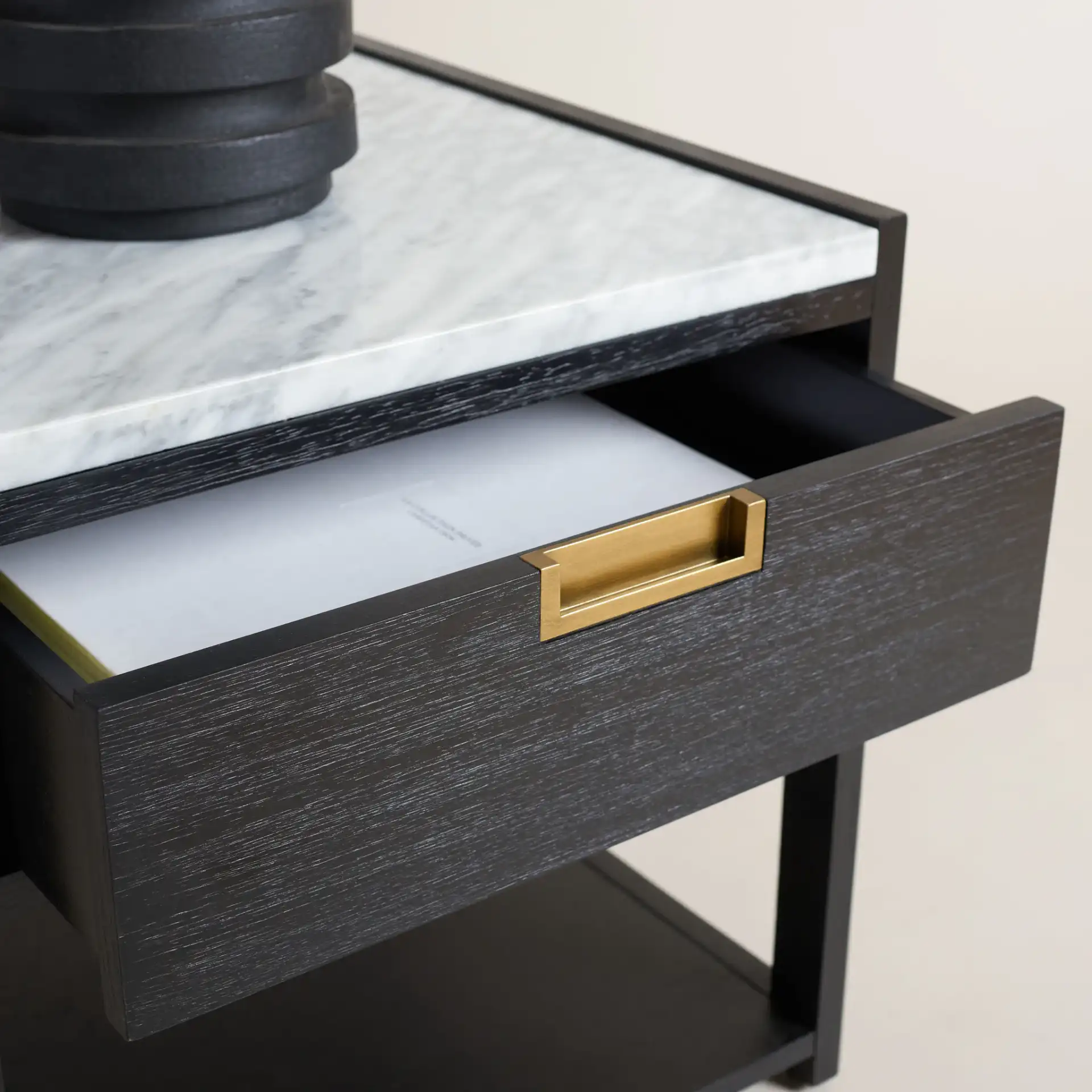 Adeline One-Drawer Nightstand in Black in a styled room