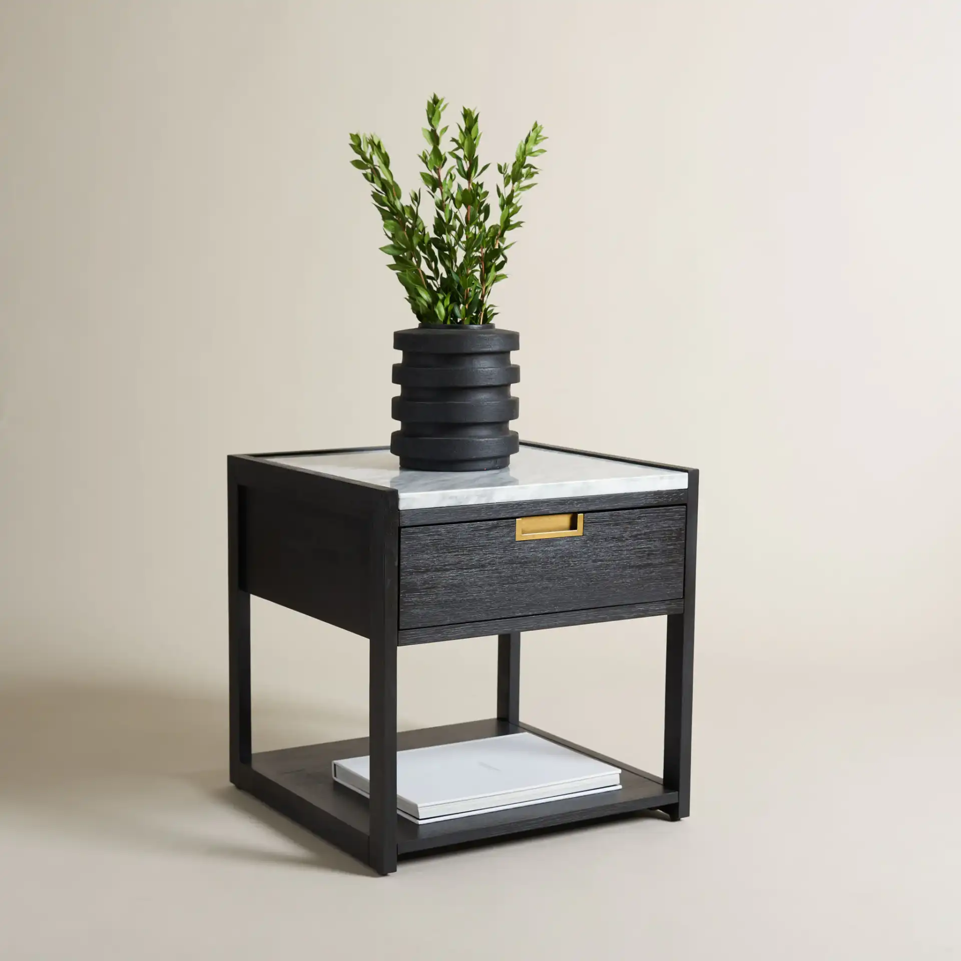 Adeline One-Drawer Nightstand in Black in a styled room