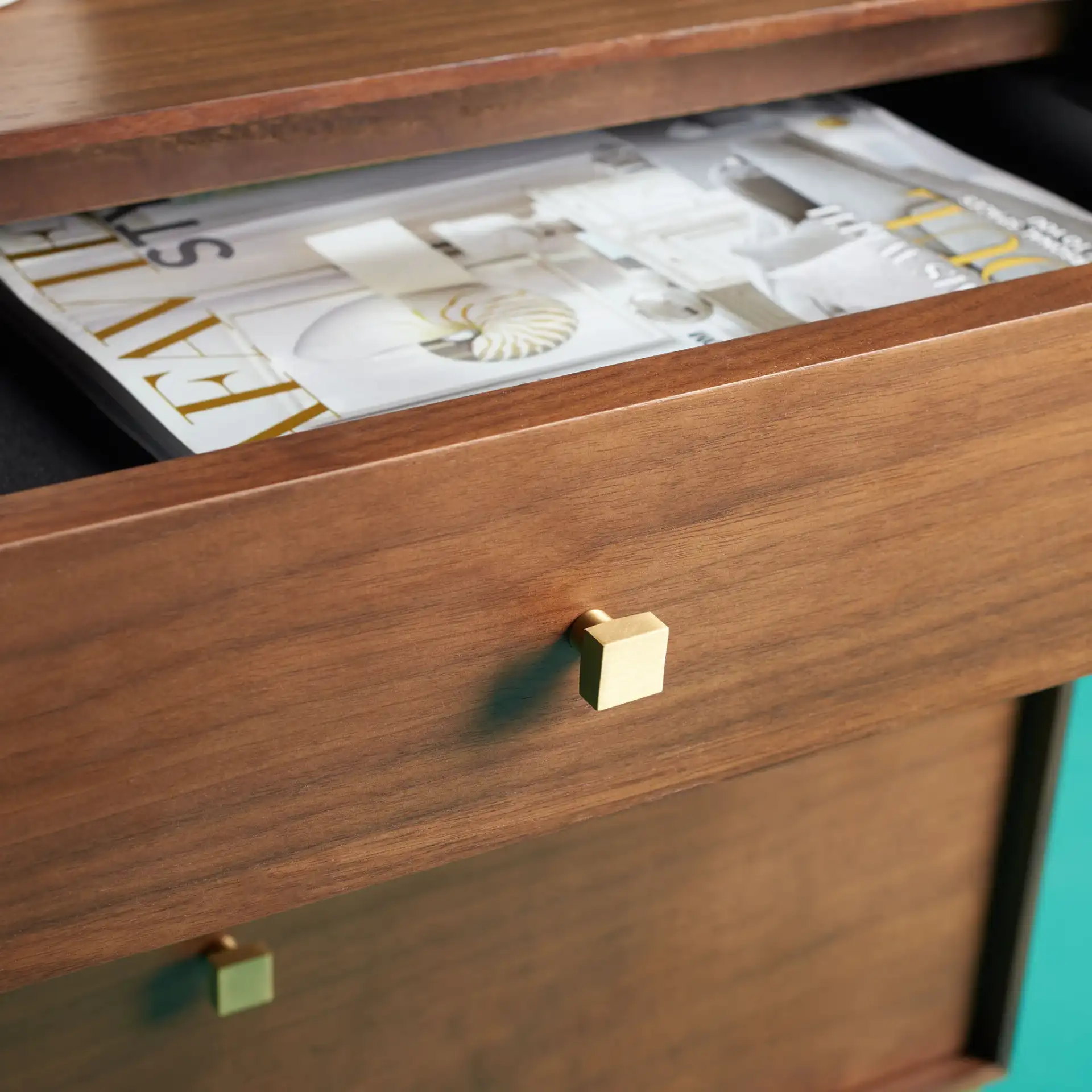 Adelyn Two-Drawer Nightstand in Charcoal / Gold in a styled room