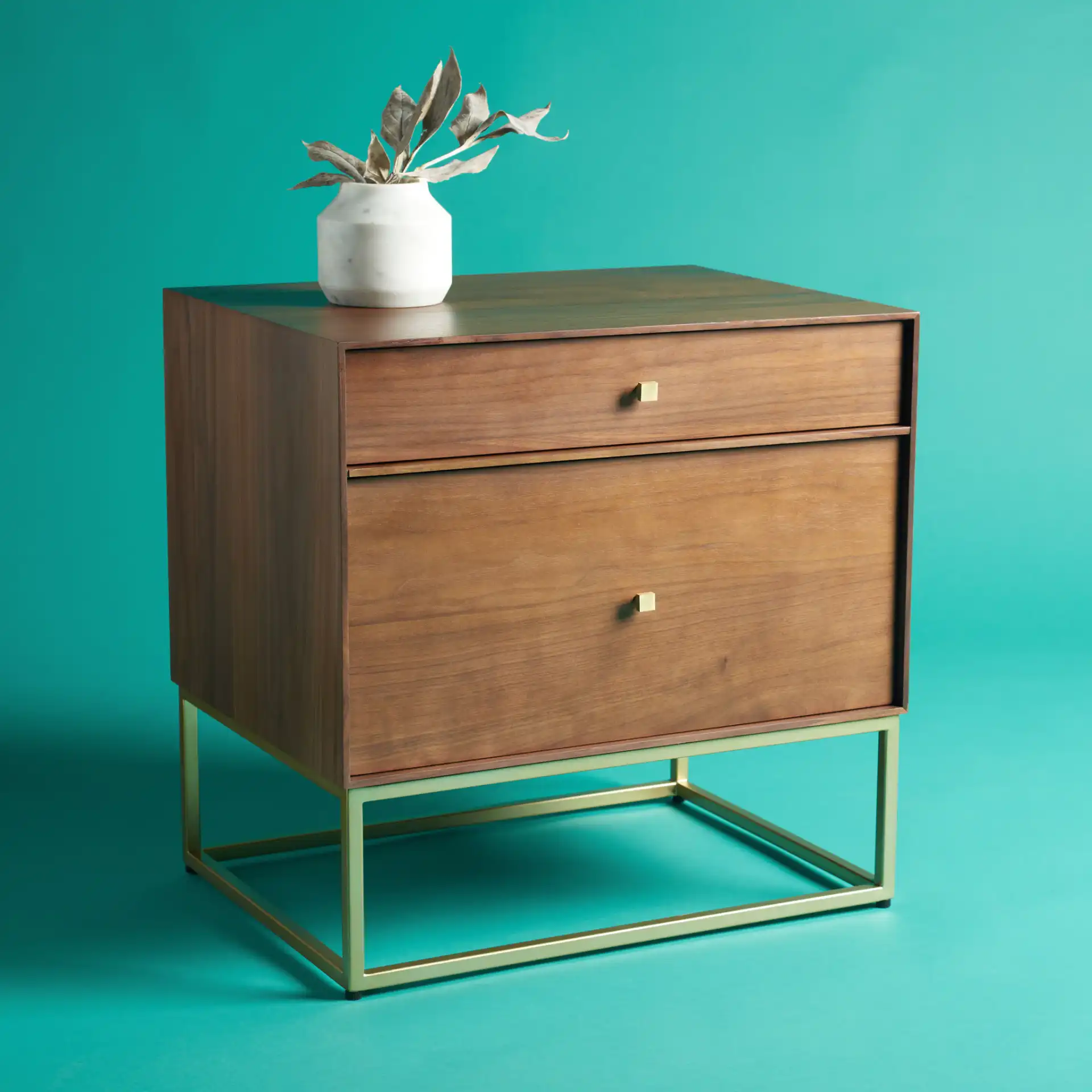 Adelyn Two-Drawer Nightstand in Charcoal / Gold in a styled room