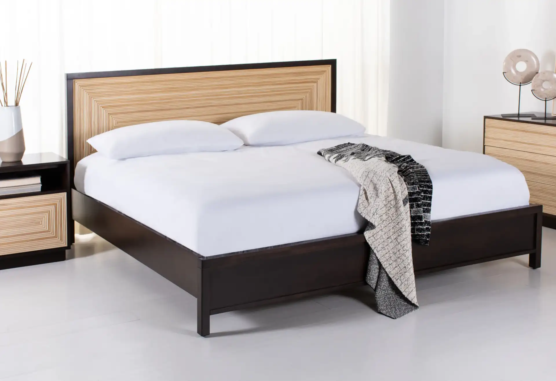 Stassie Cane Bed in Natural / Black in a styled room