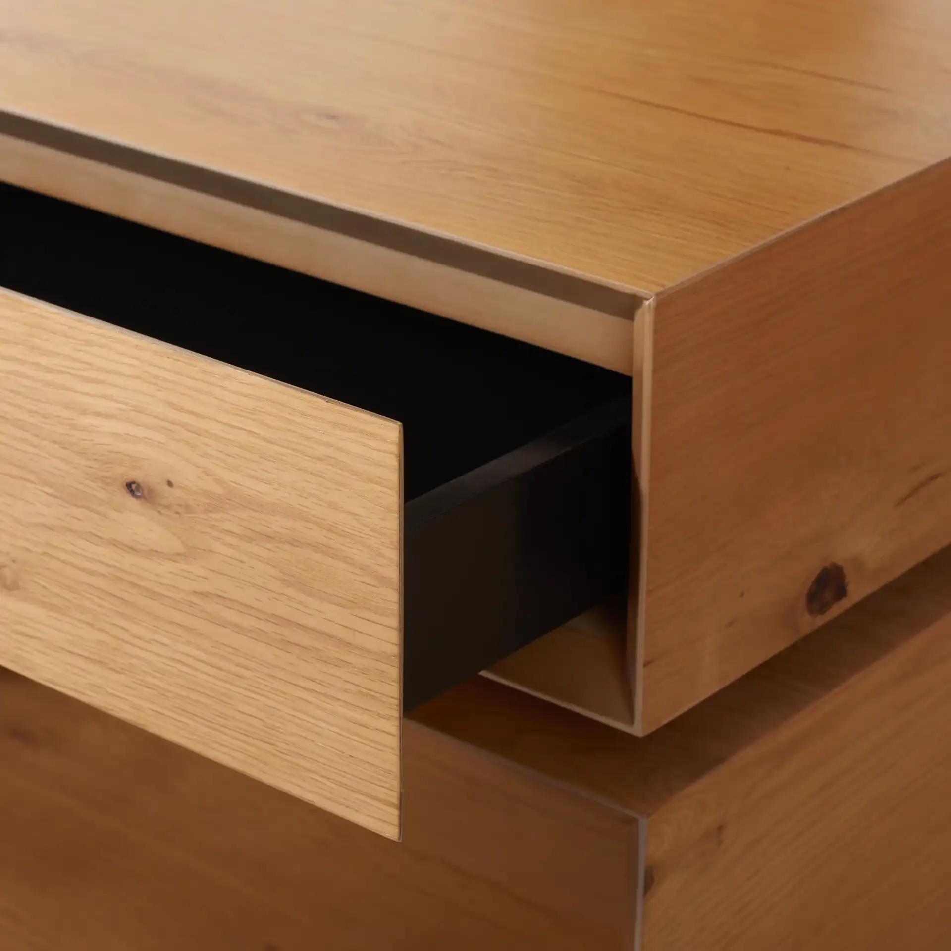 Geraldo Rotating Coffee Table in Oak in a styled room