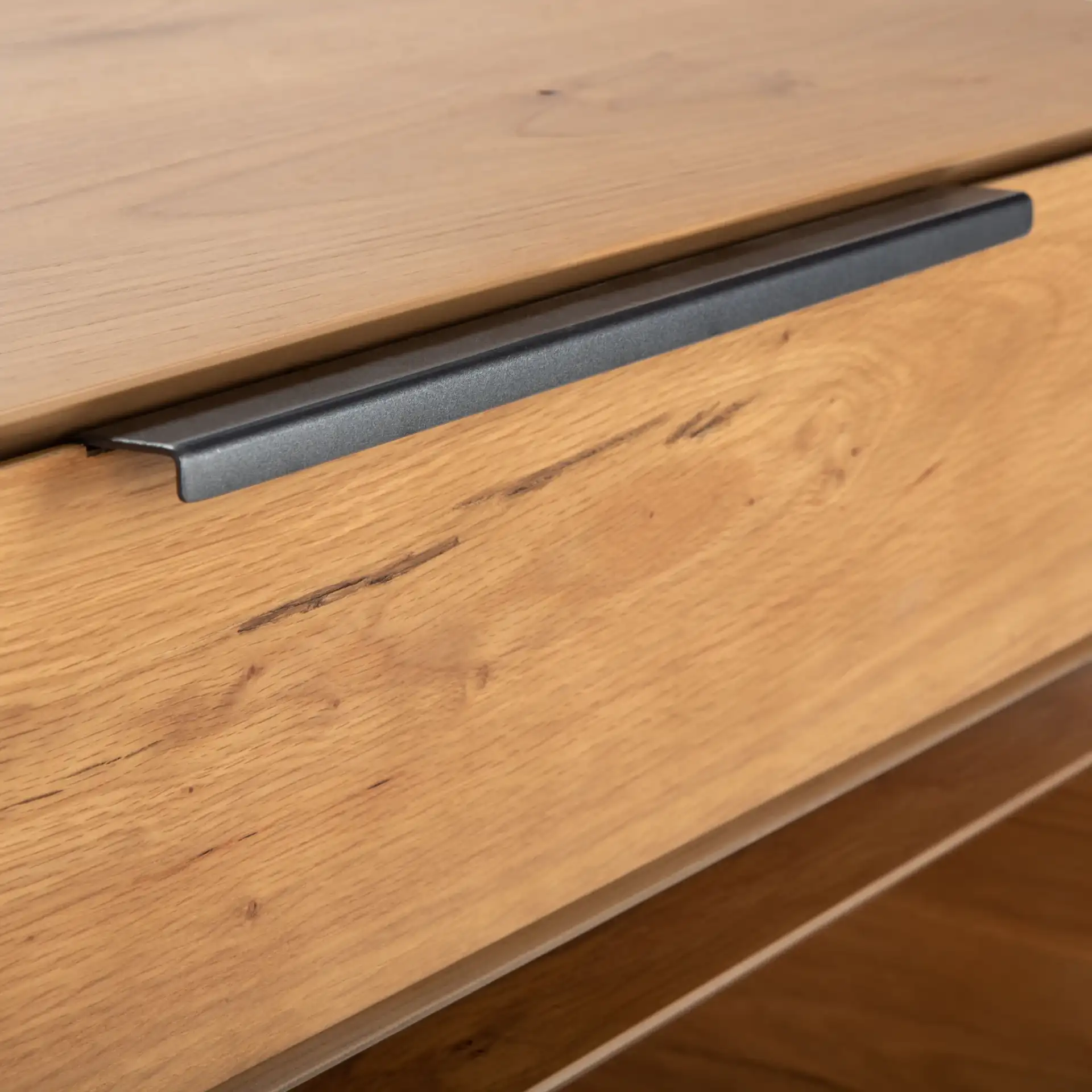 Geraldo Rotating Coffee Table in Oak in a styled room