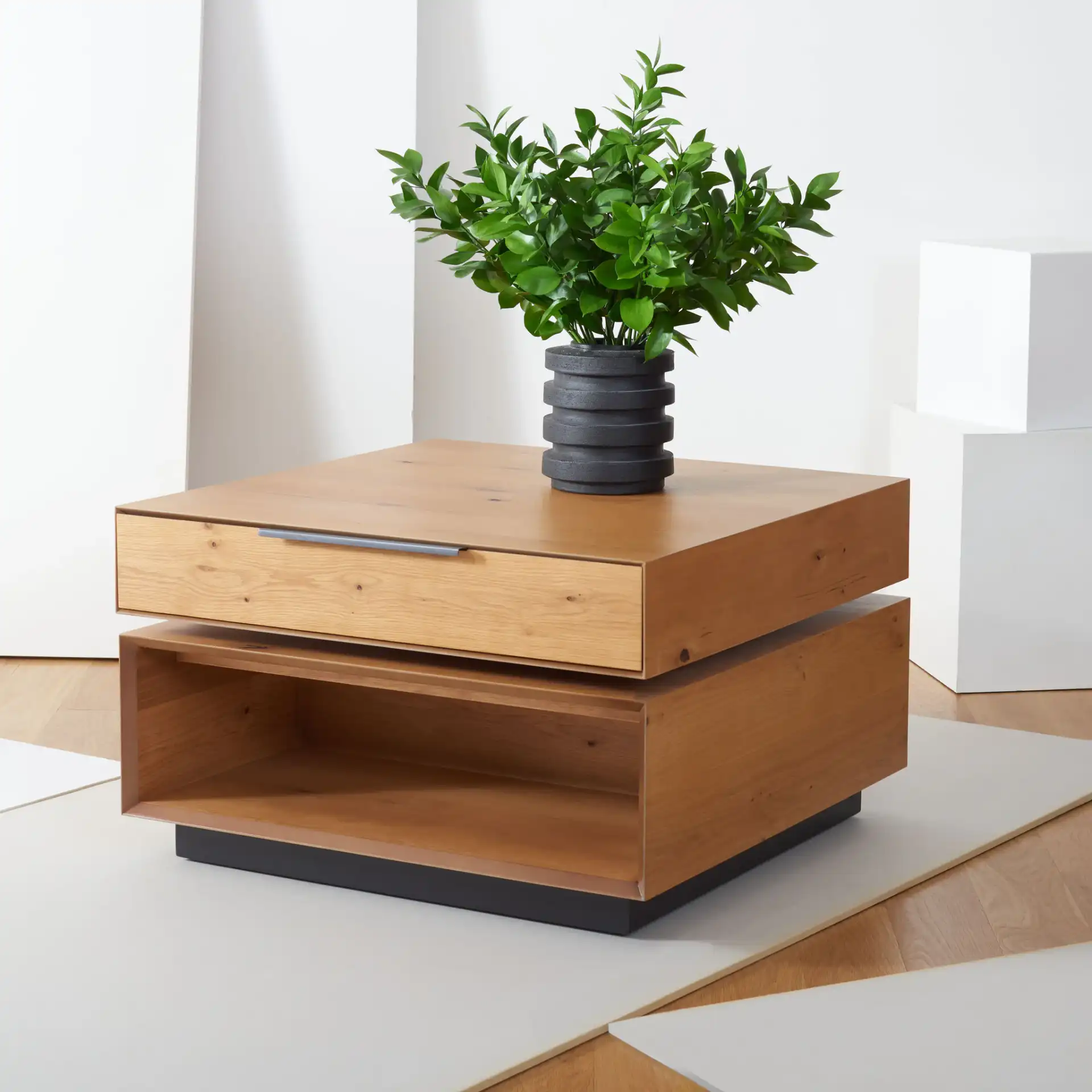 Geraldo Rotating Coffee Table in Oak in a styled room