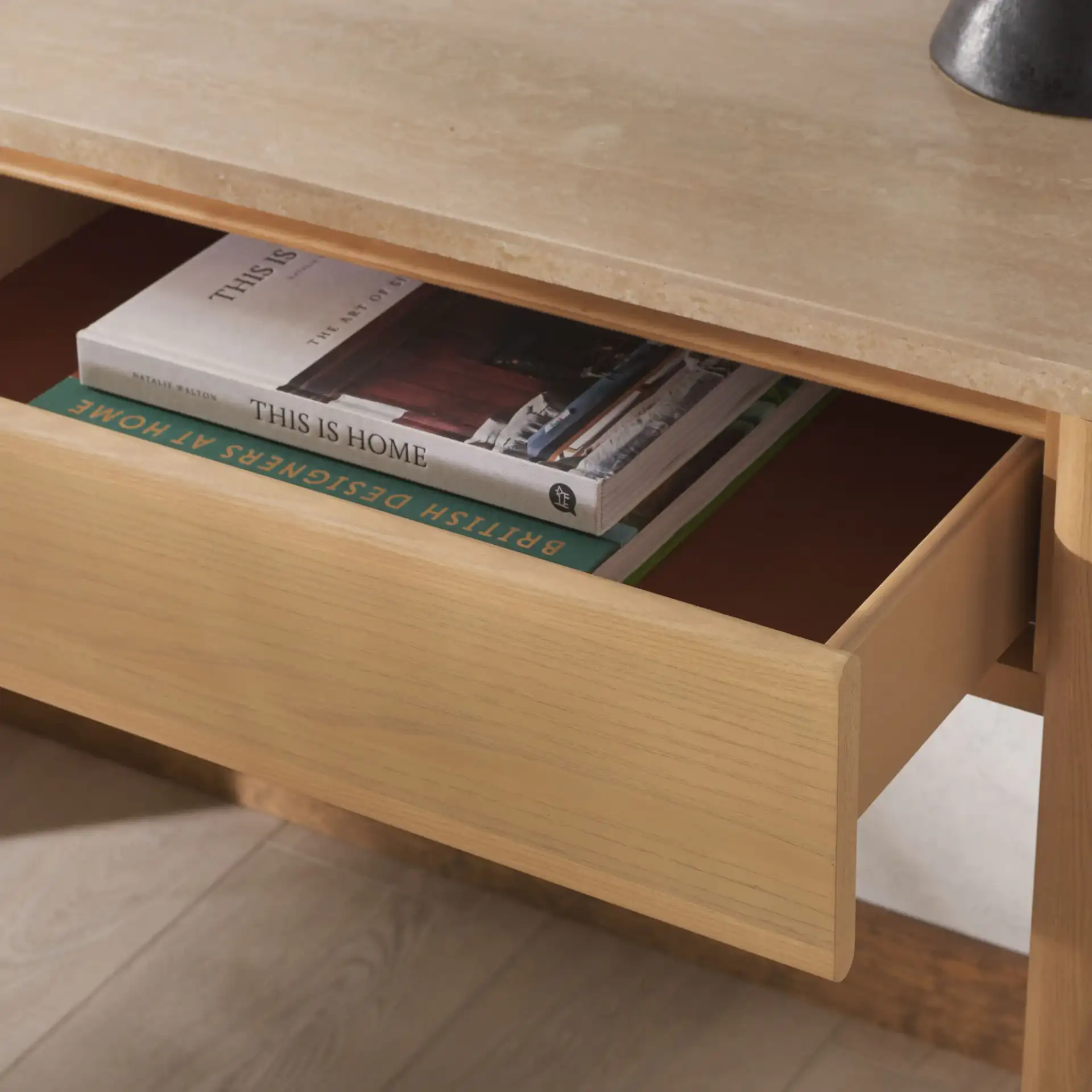 Bellarose Traver Console Table in Natural / Travertine in a styled room