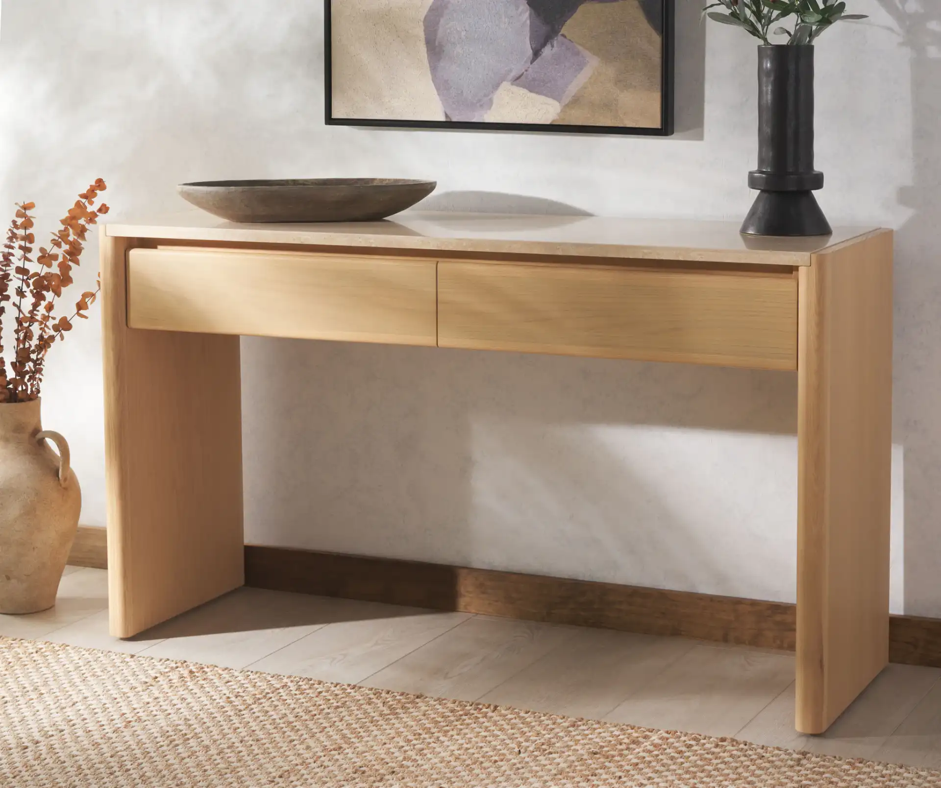 Bellarose Traver Console Table in Natural / Travertine in a styled room