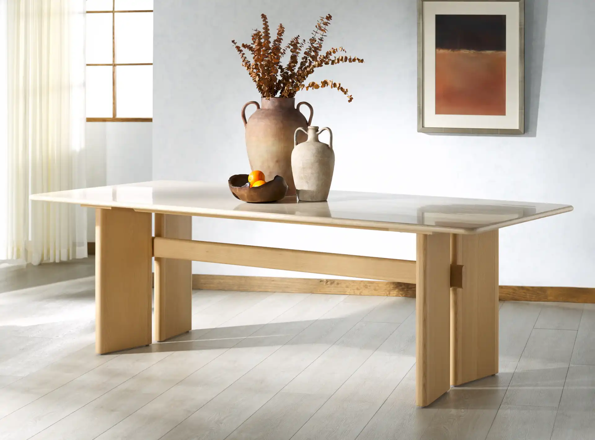 Bellarose Travertine Dining Table in Natural / Travertine in a styled room