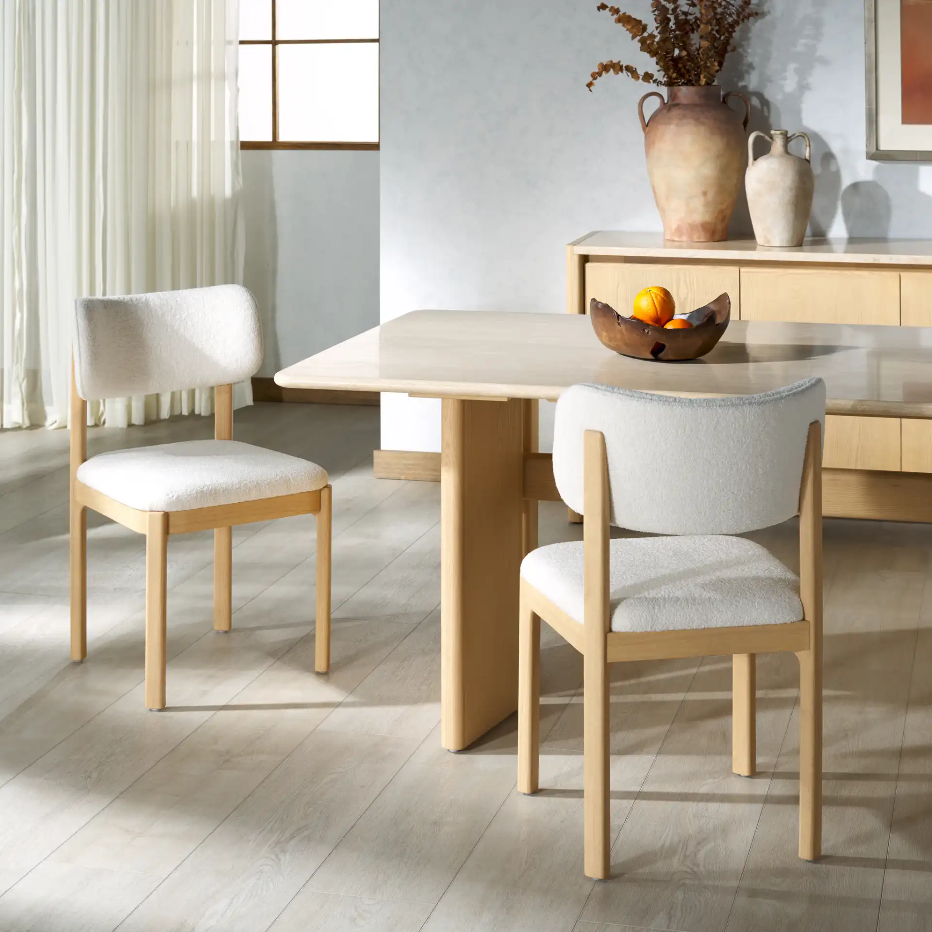 Trystan Boucle Dining Chair (Set of 2) in Ivory / Natural in a styled room