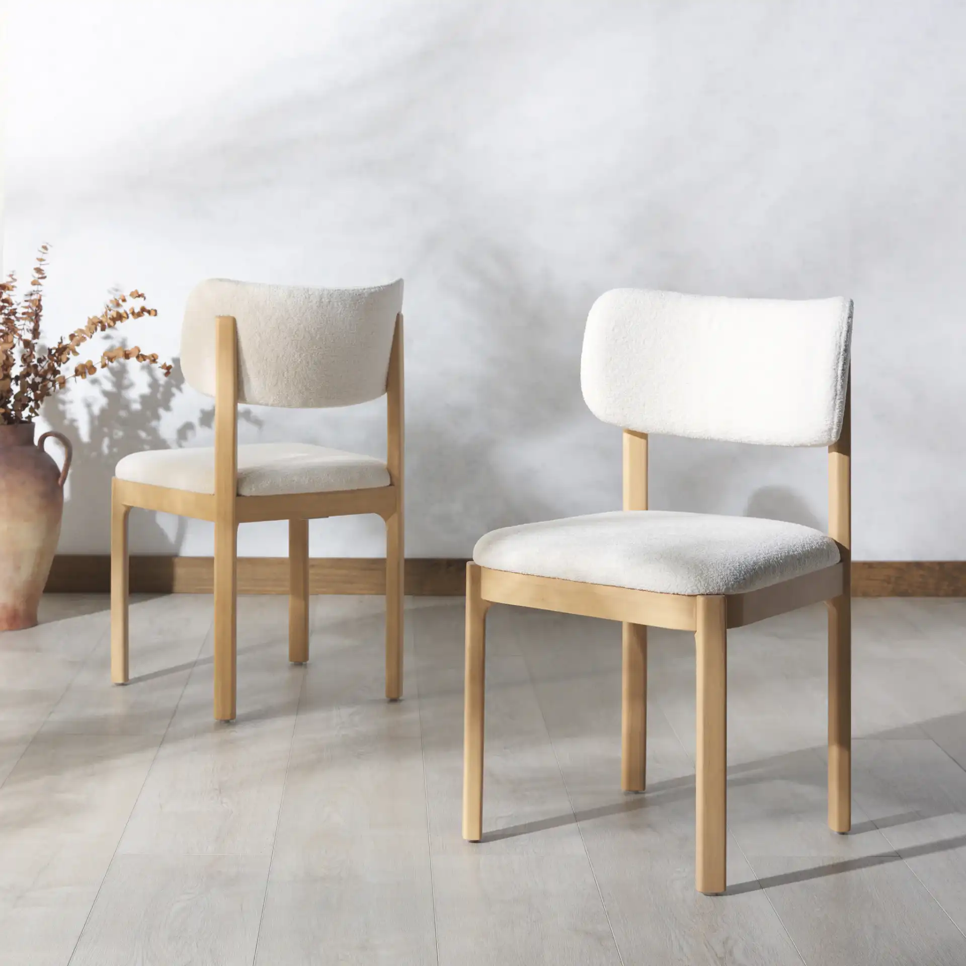 Trystan Boucle Dining Chair (Set of 2) in Ivory / Natural in a styled room