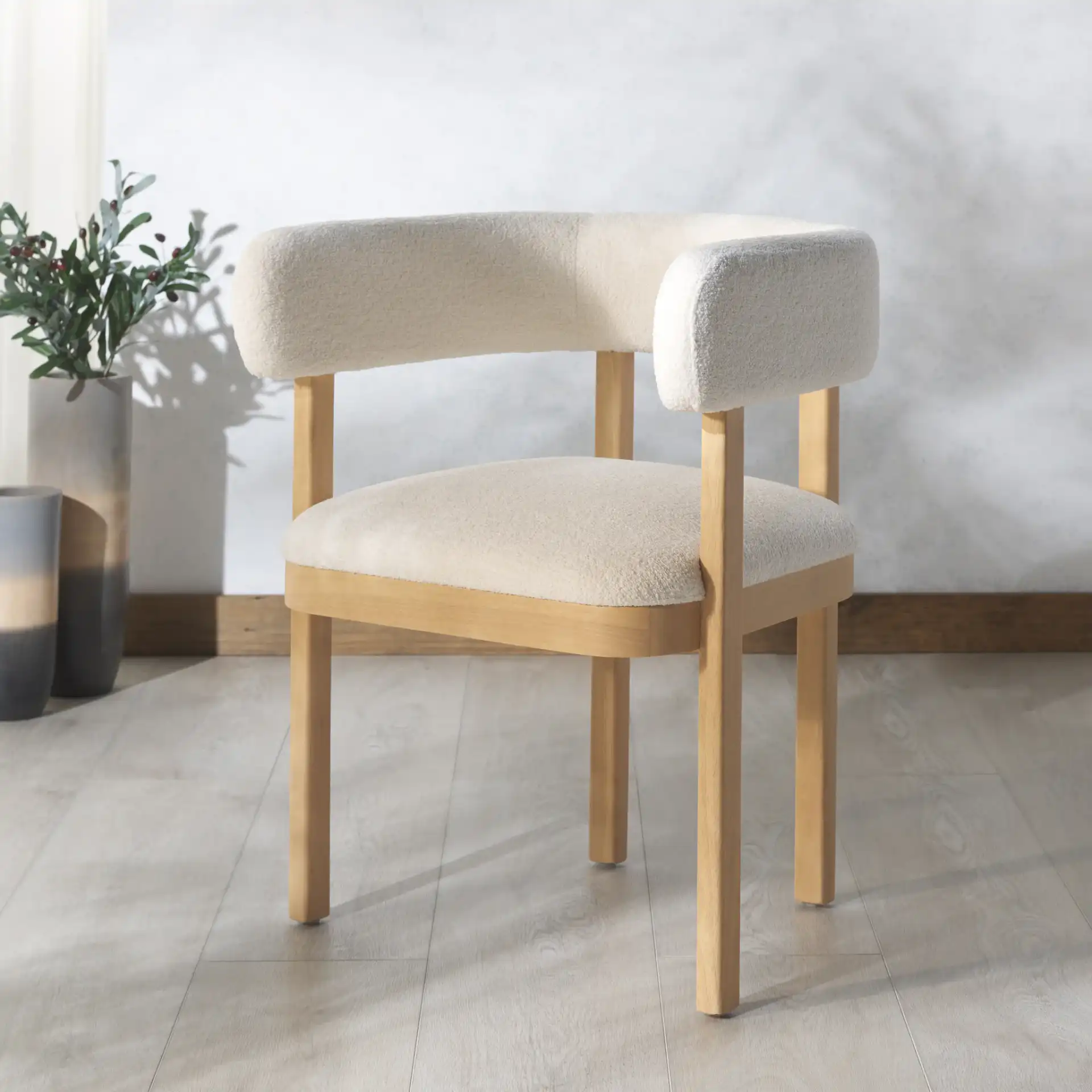 Trystan Boucle Arm Chair in Ivory / Natural in a styled room