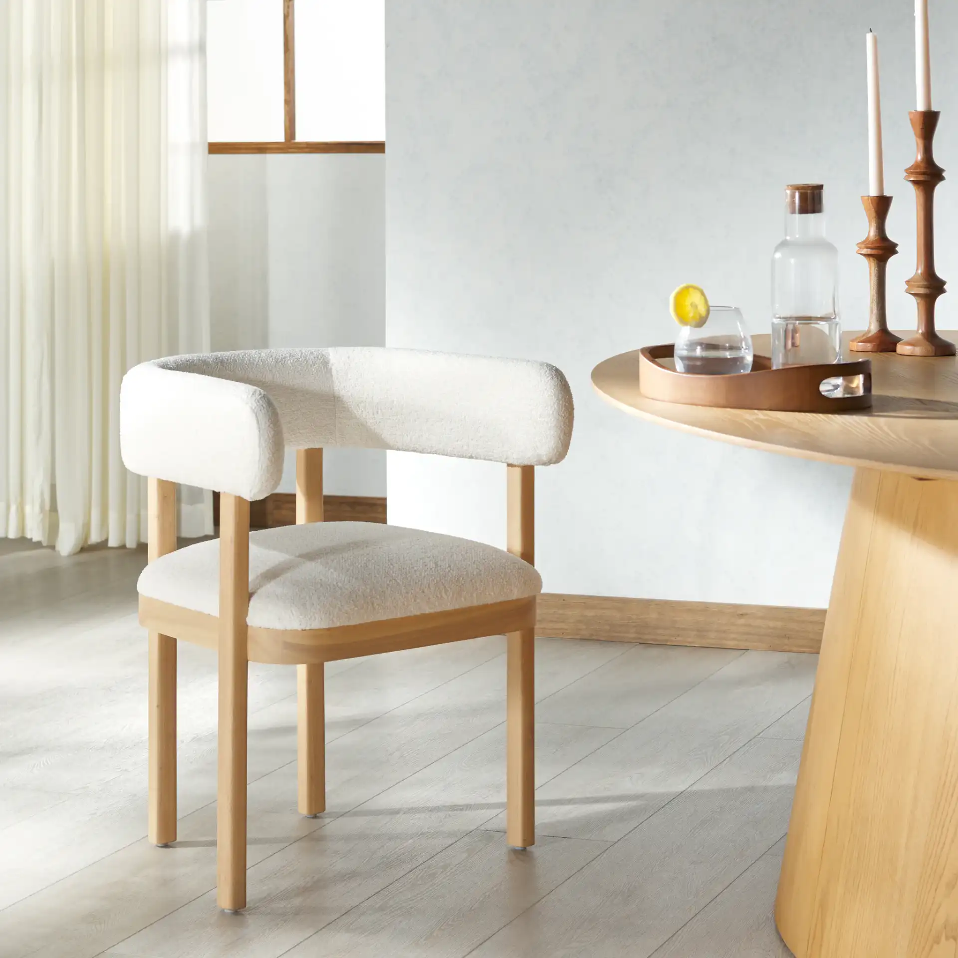 Trystan Boucle Arm Chair in Ivory / Natural in a styled room