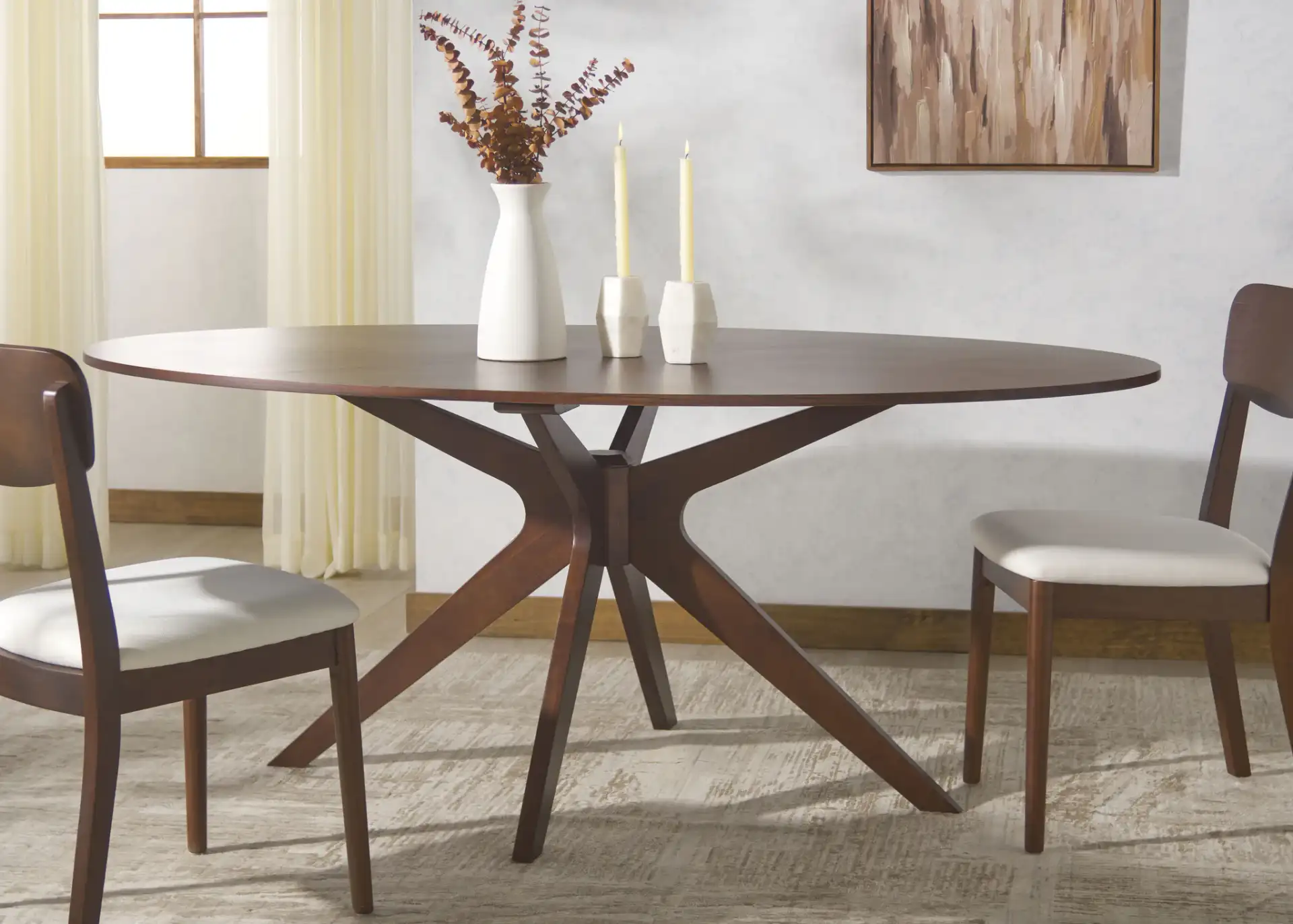 Hawkins Wood Oval Dining Table in Walnut in a styled room