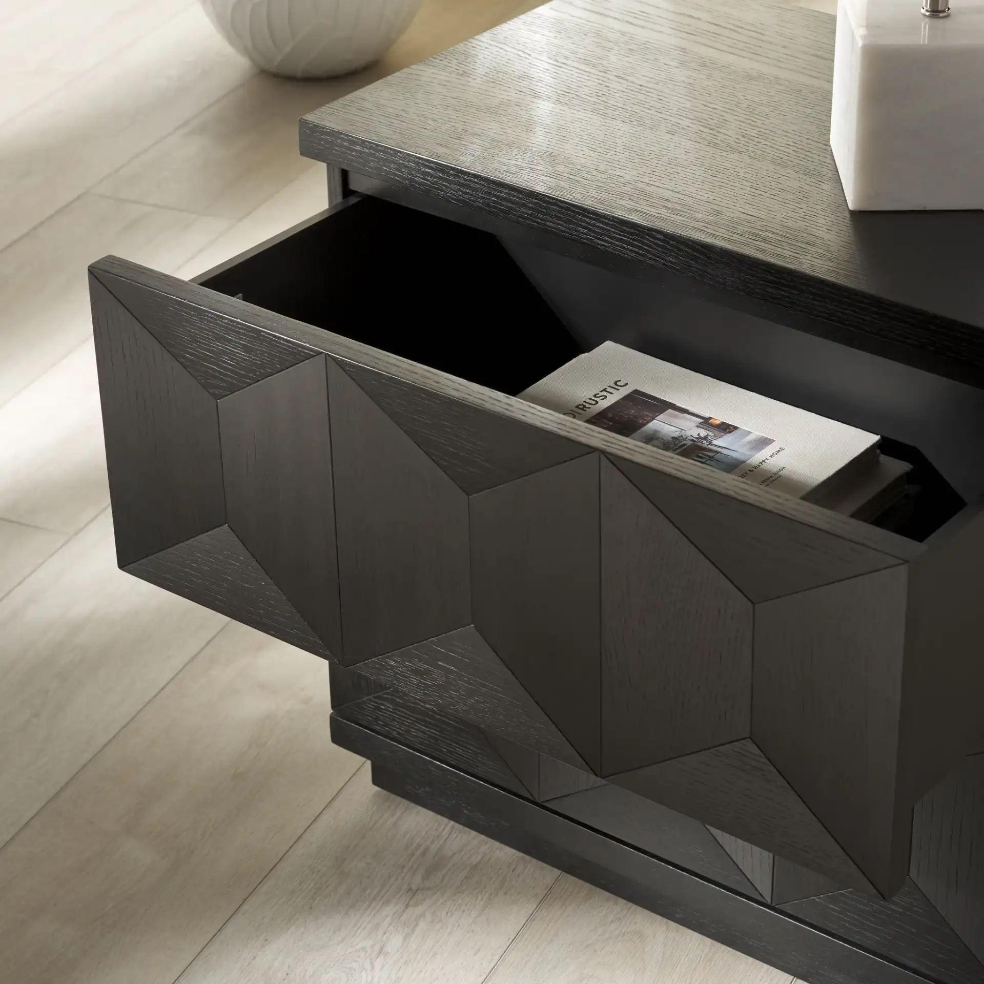 Deziree Wood Two-Drawer Nightstand in Black in a styled room