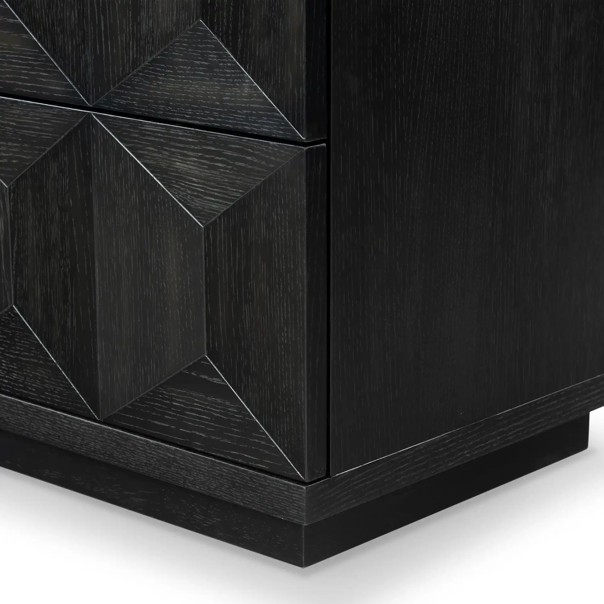 Deziree Wood Two-Drawer Nightstand in Black in a styled room