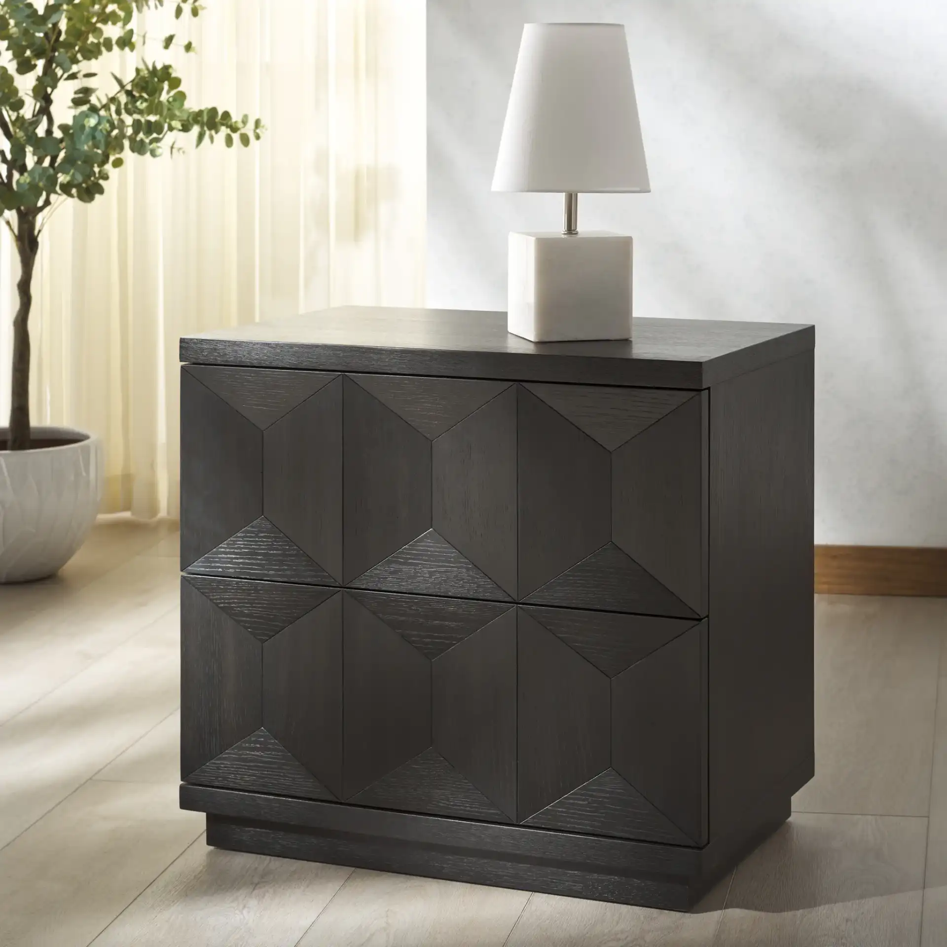 Deziree Wood Two-Drawer Nightstand in Black in a styled room