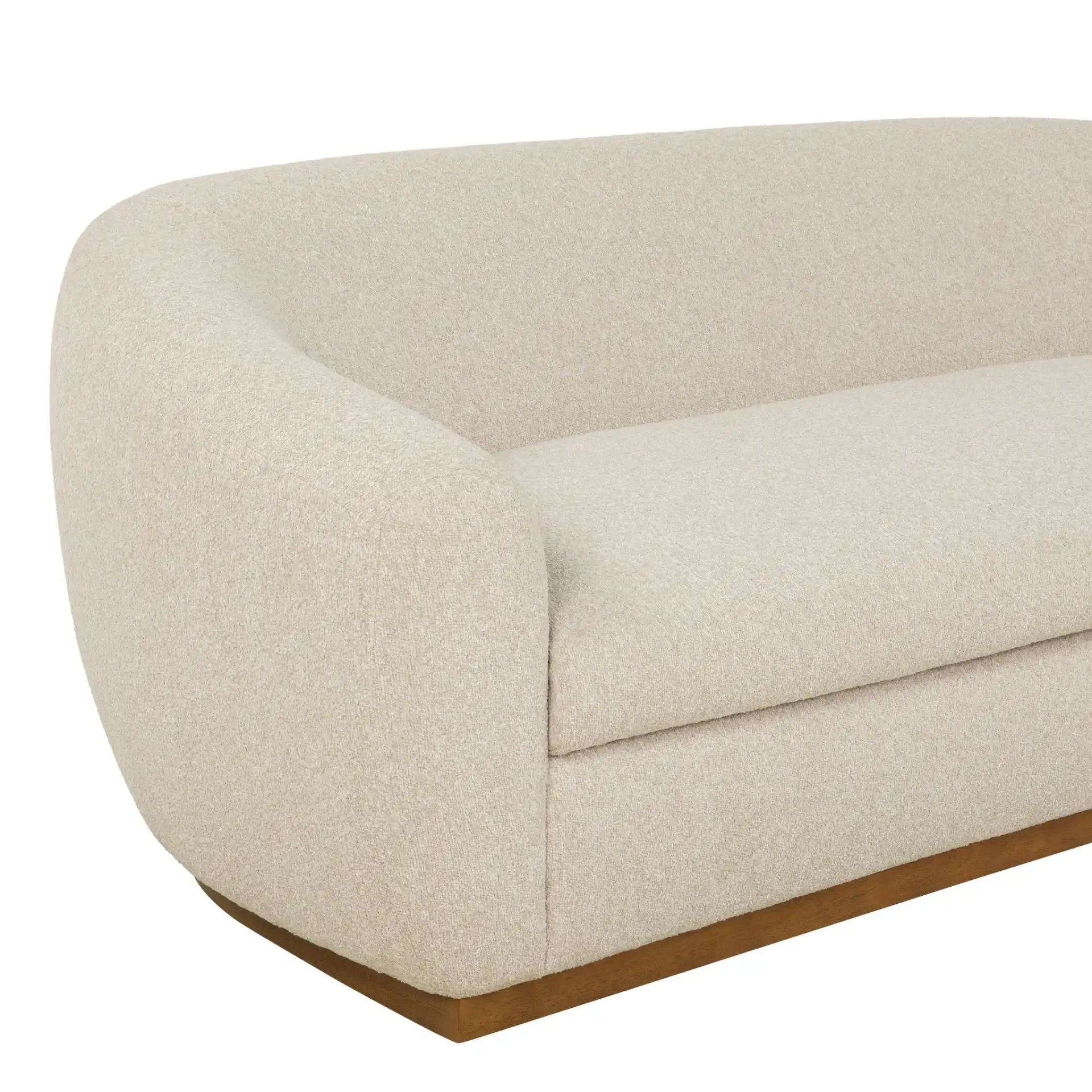 Tylah Boucle Sofa in Beige / Walnut in a styled room
