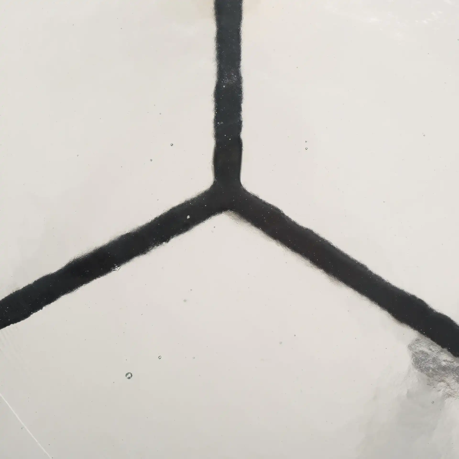 Seymour Cast Glass Accent Table in Black / Clear, detail view