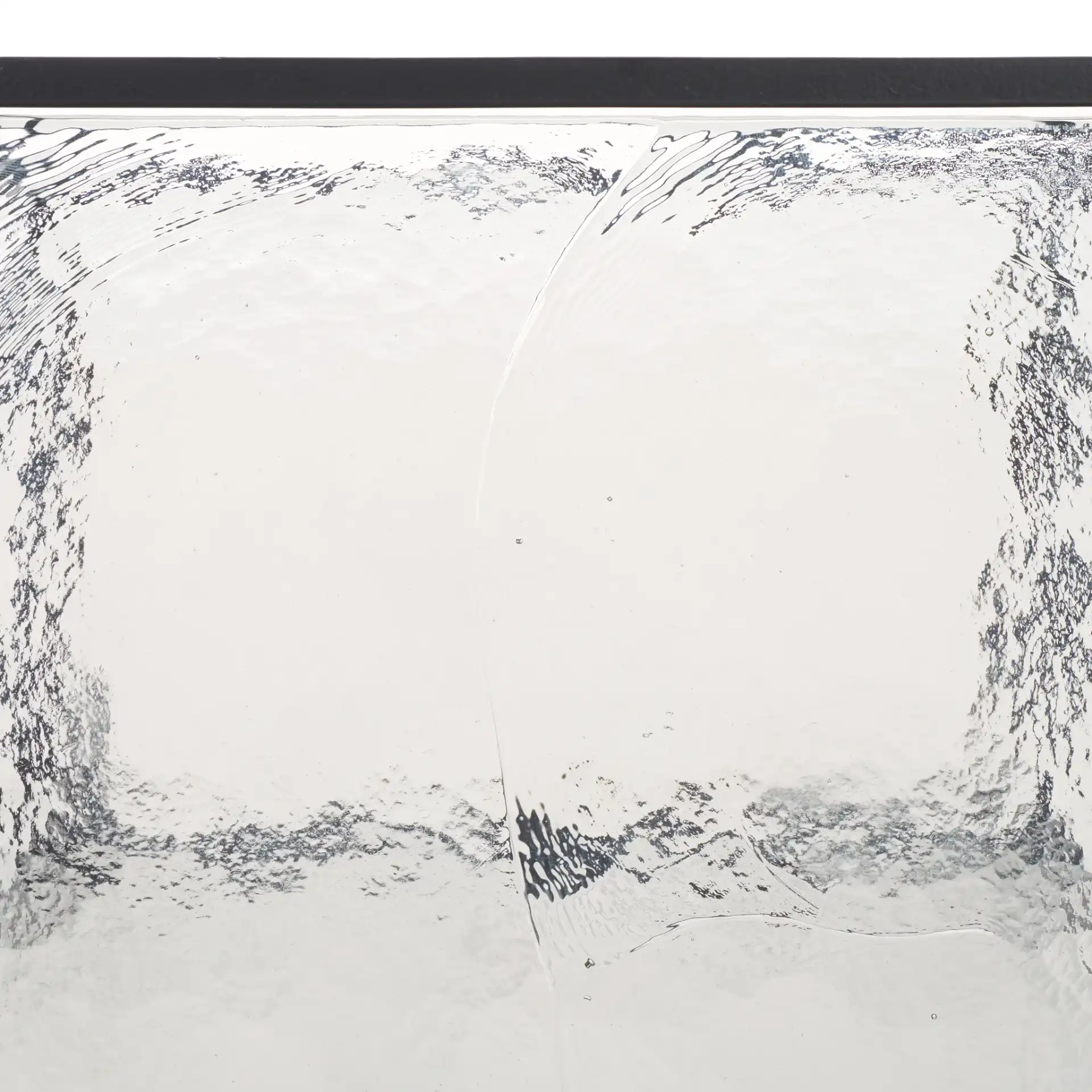 Ferguson Cast Glass Accent Table in Black / Clear, detail view