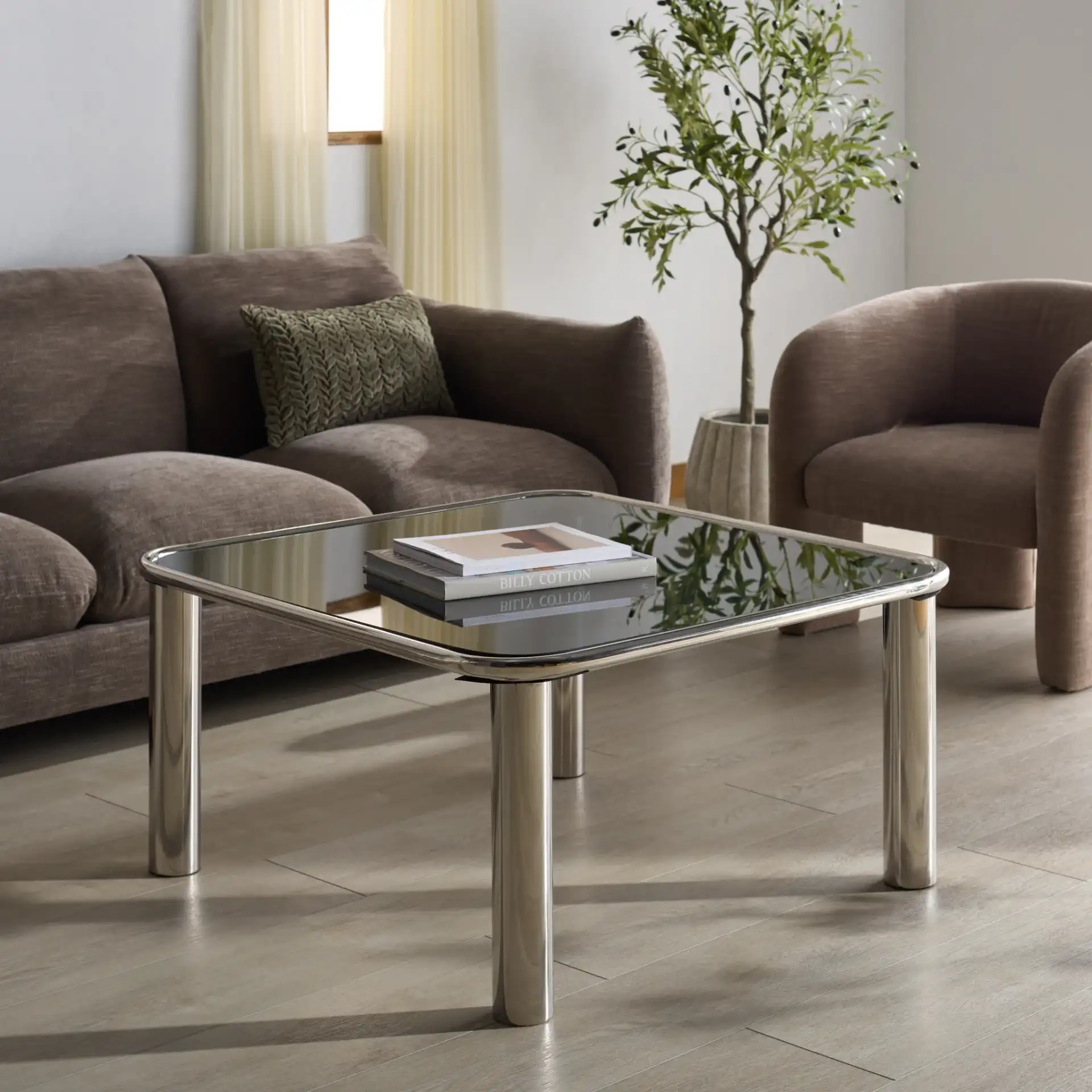 Elizanette Square Coffee Table in Chrome / Black in a styled room
