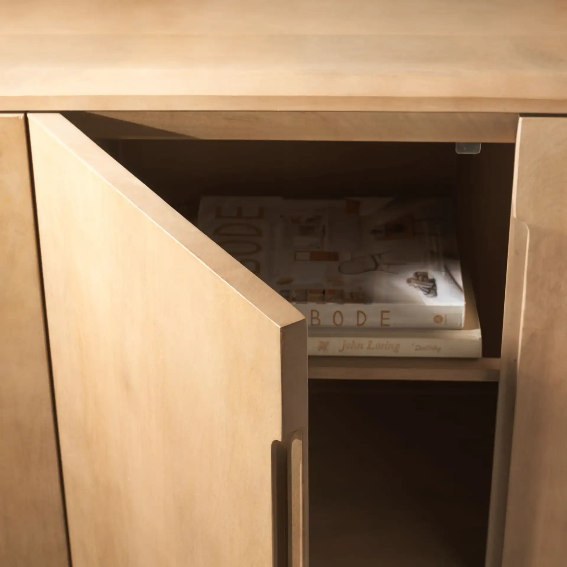 Tuckerman Four-Door Wood Sideboard in Natural in a styled room