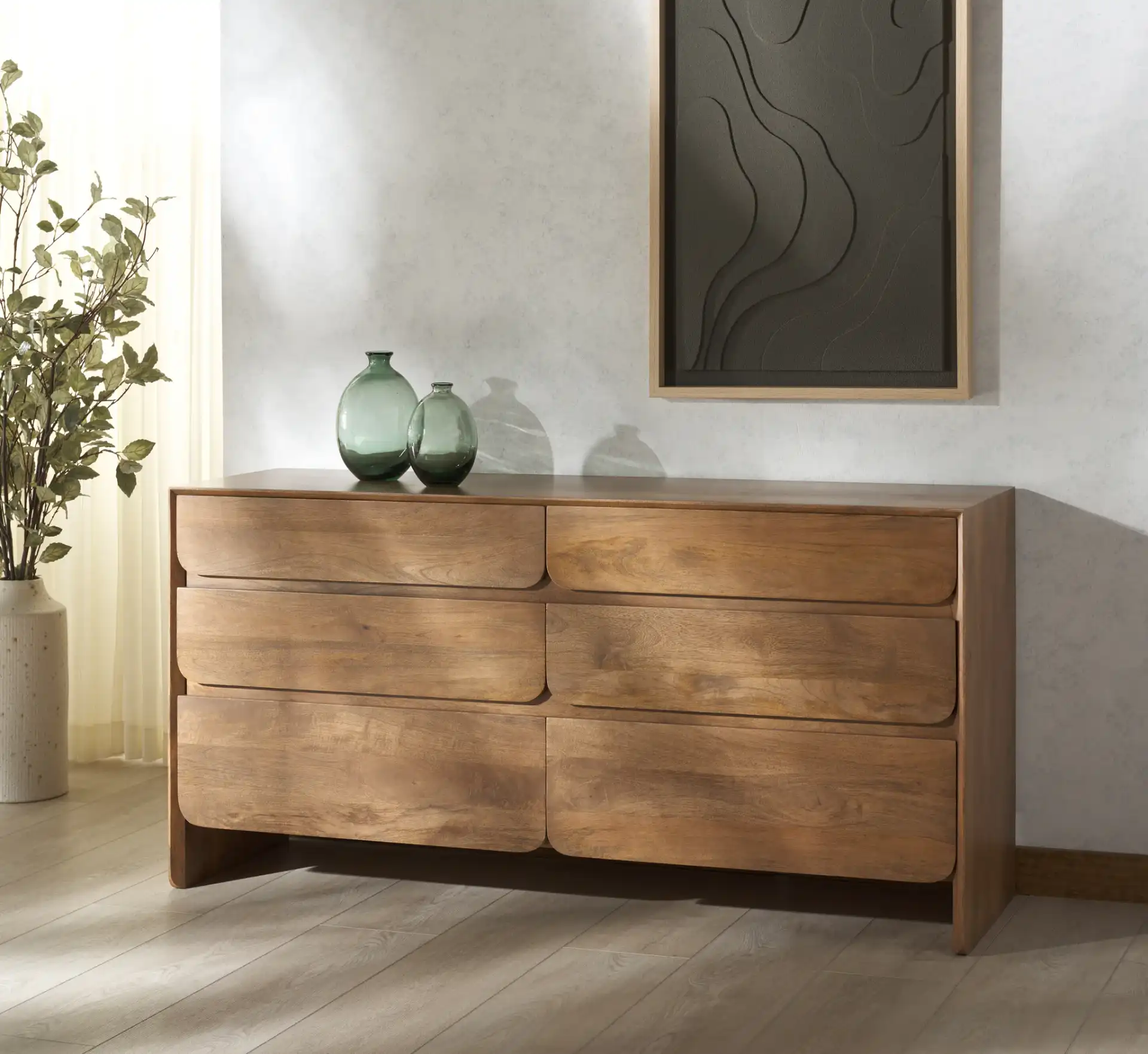 Grigorio Six-Drawer Dresser in Brown in a styled room