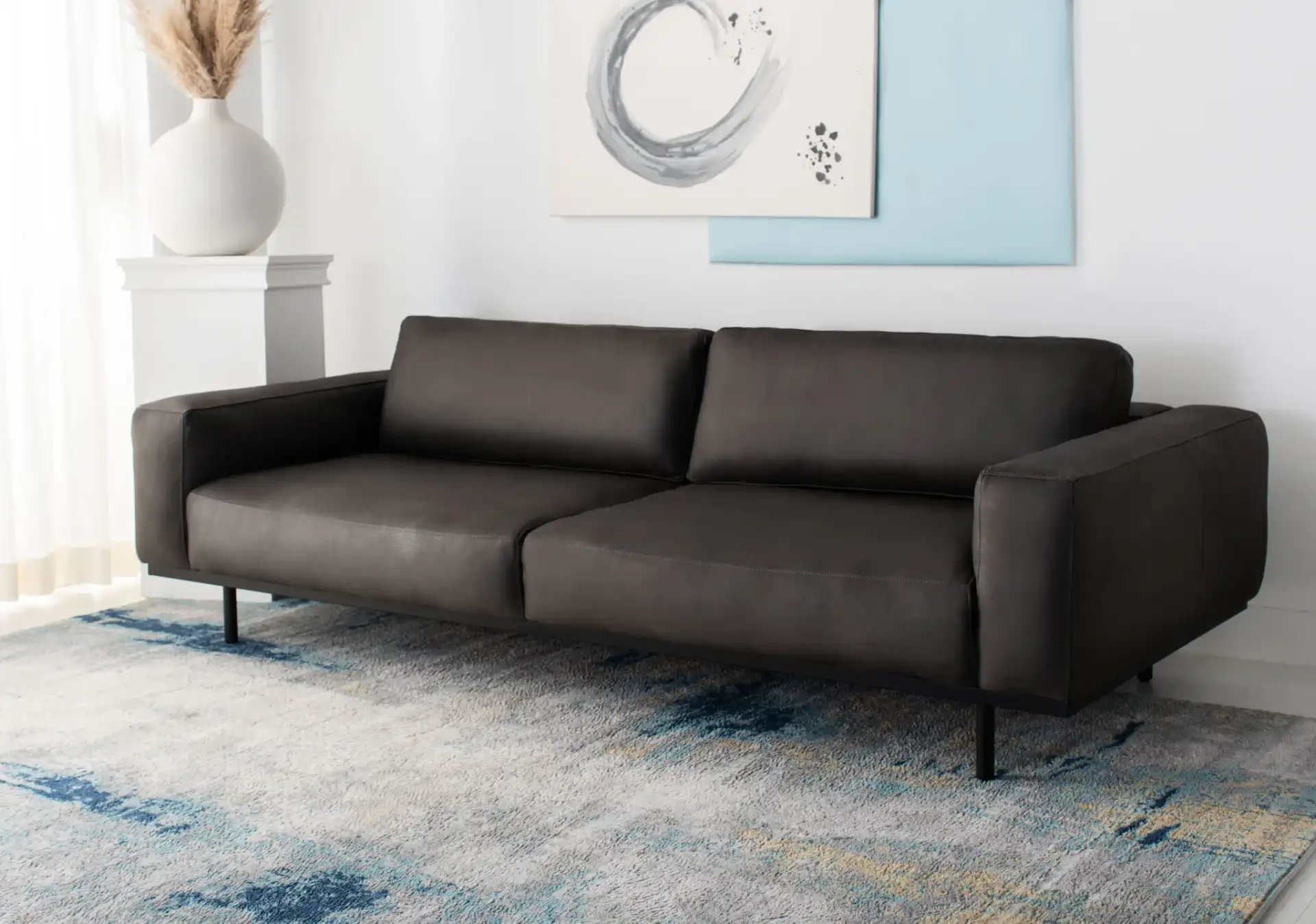 Elyssa Leather Sofa in Graphite in a styled room