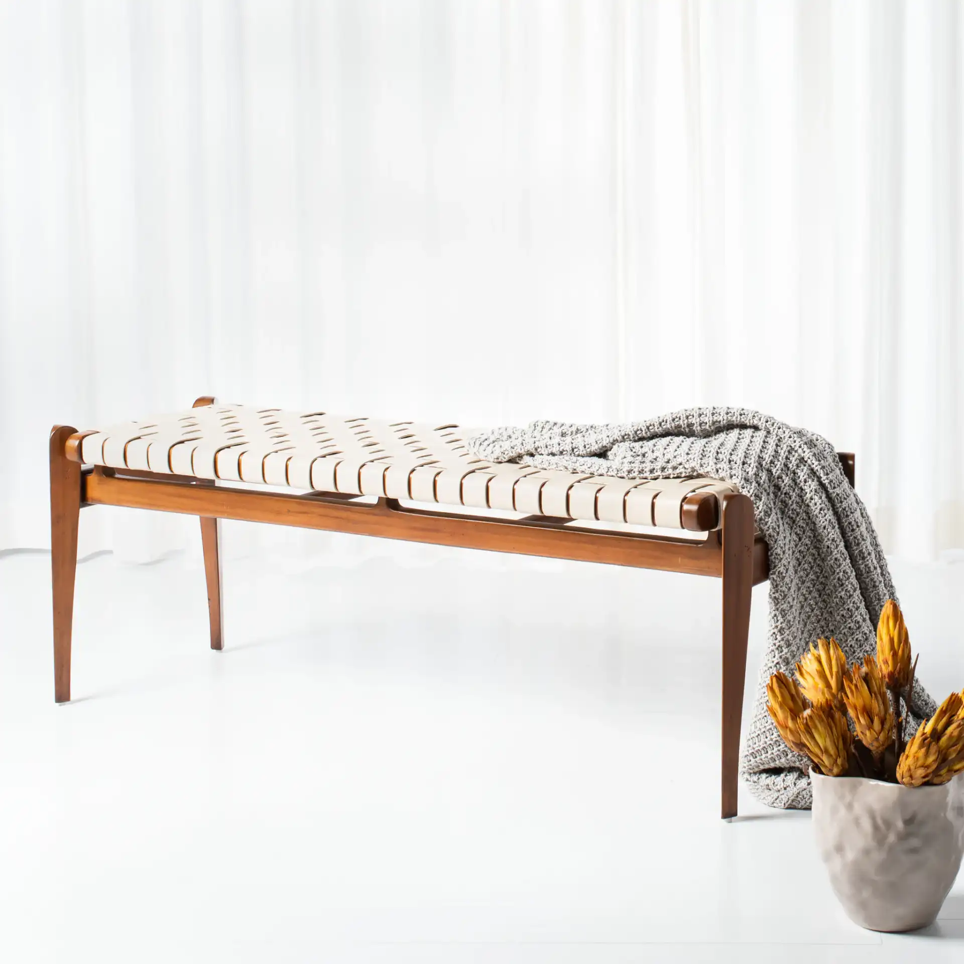Dilan Leather Bench in White / Light Brown in a styled room