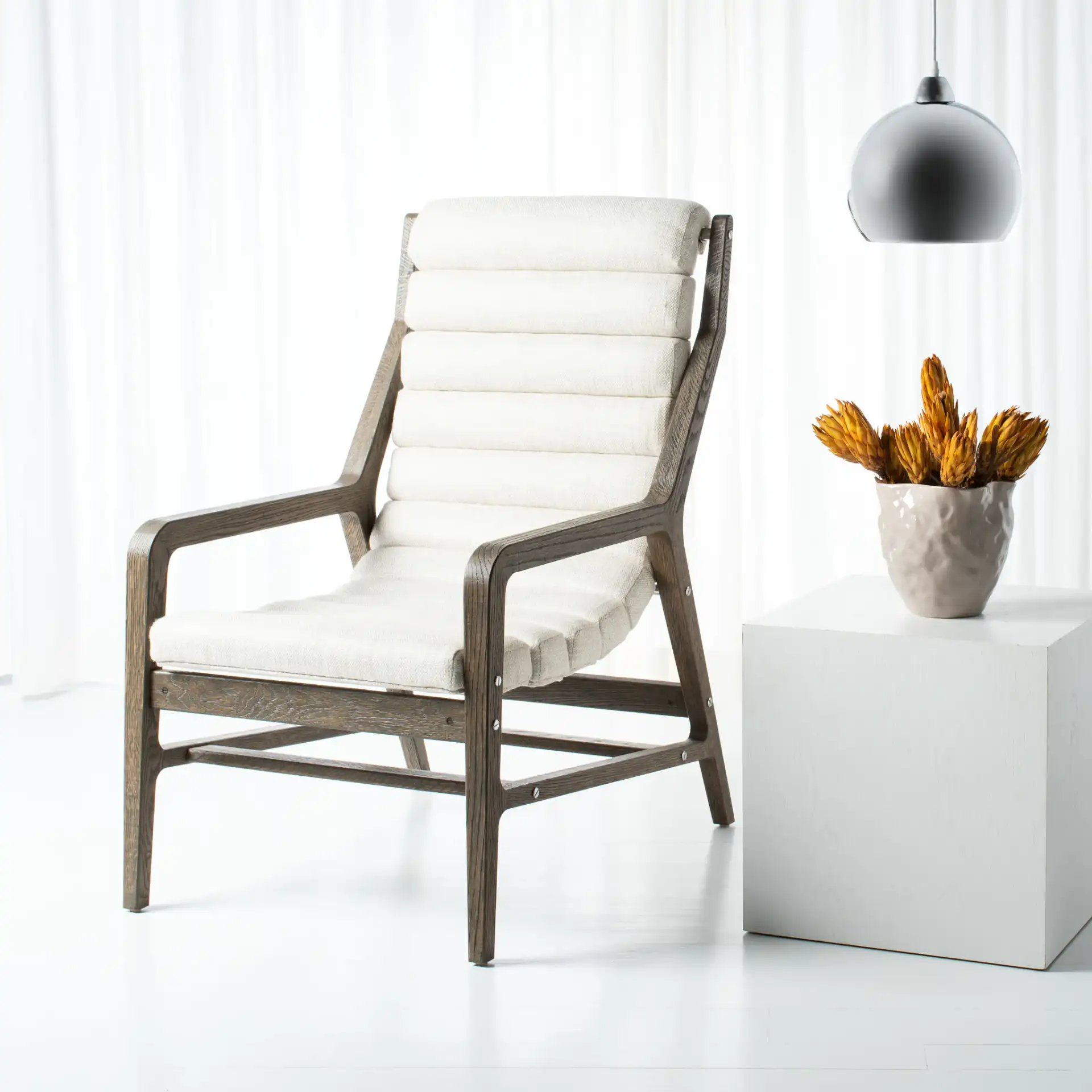 Delaney Channel Tufted Chair in White in a styled room