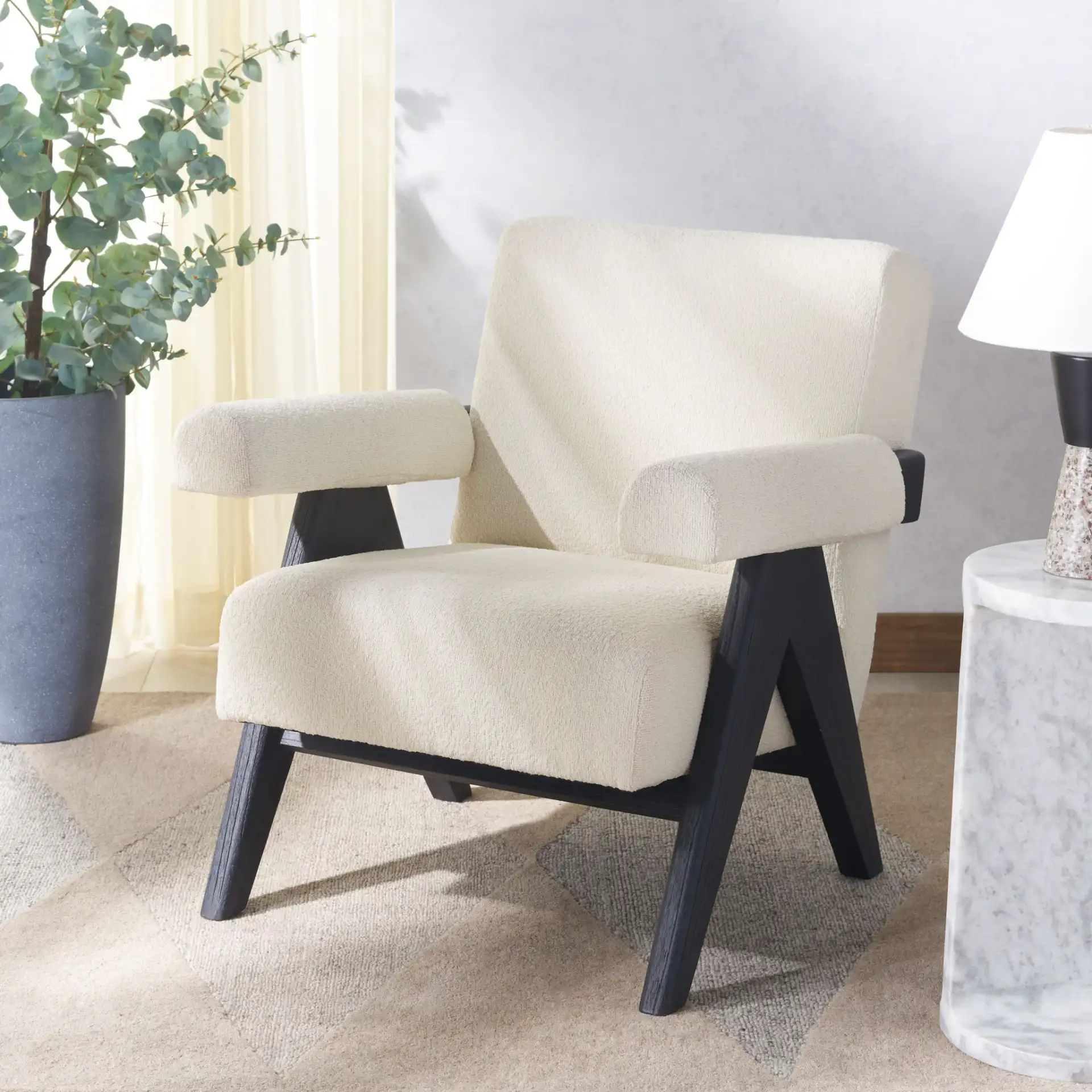 Billie Upholstered Accent Chair in Beige / Black in a styled room