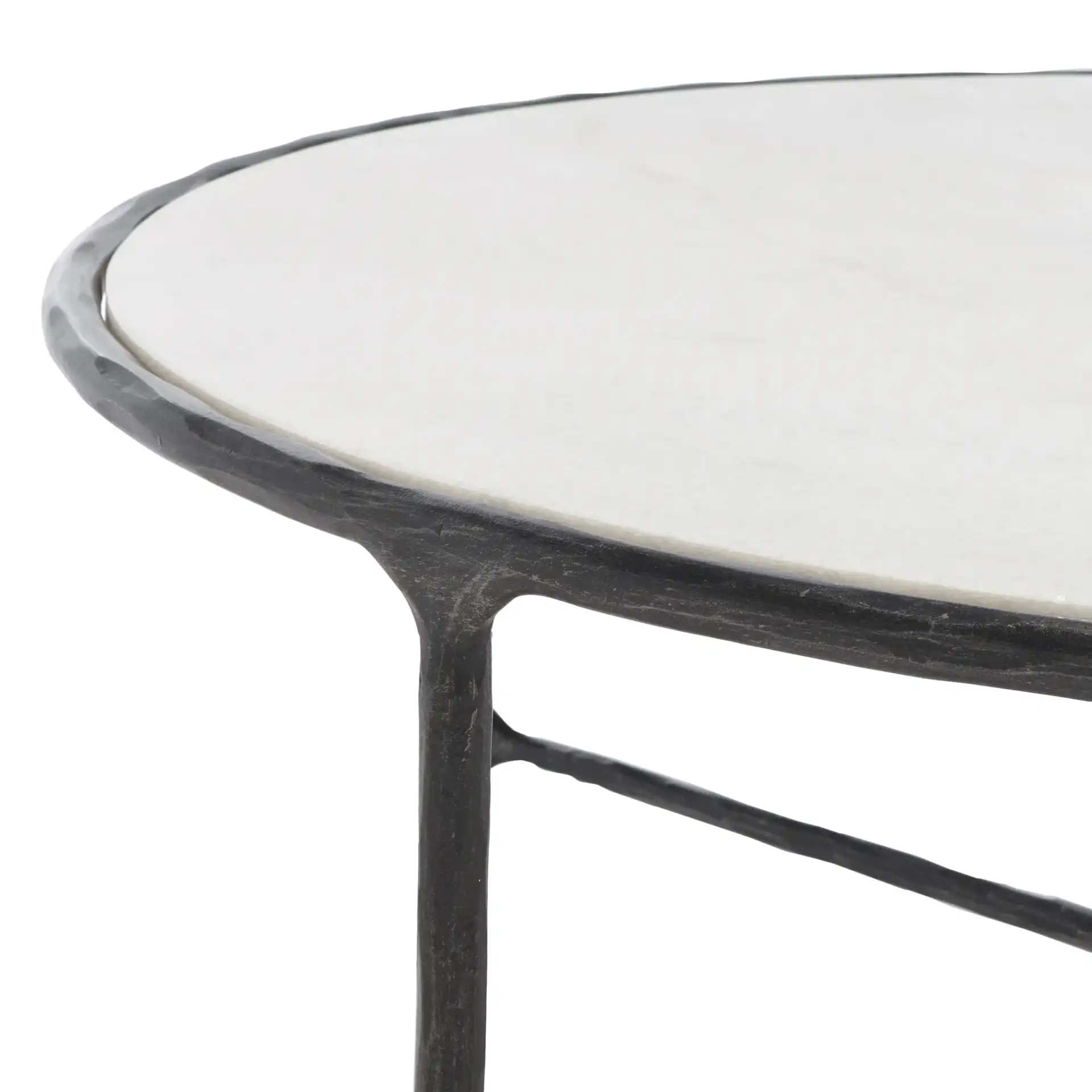 Jessa Round Metal Coffee Table in Black / White in a styled room