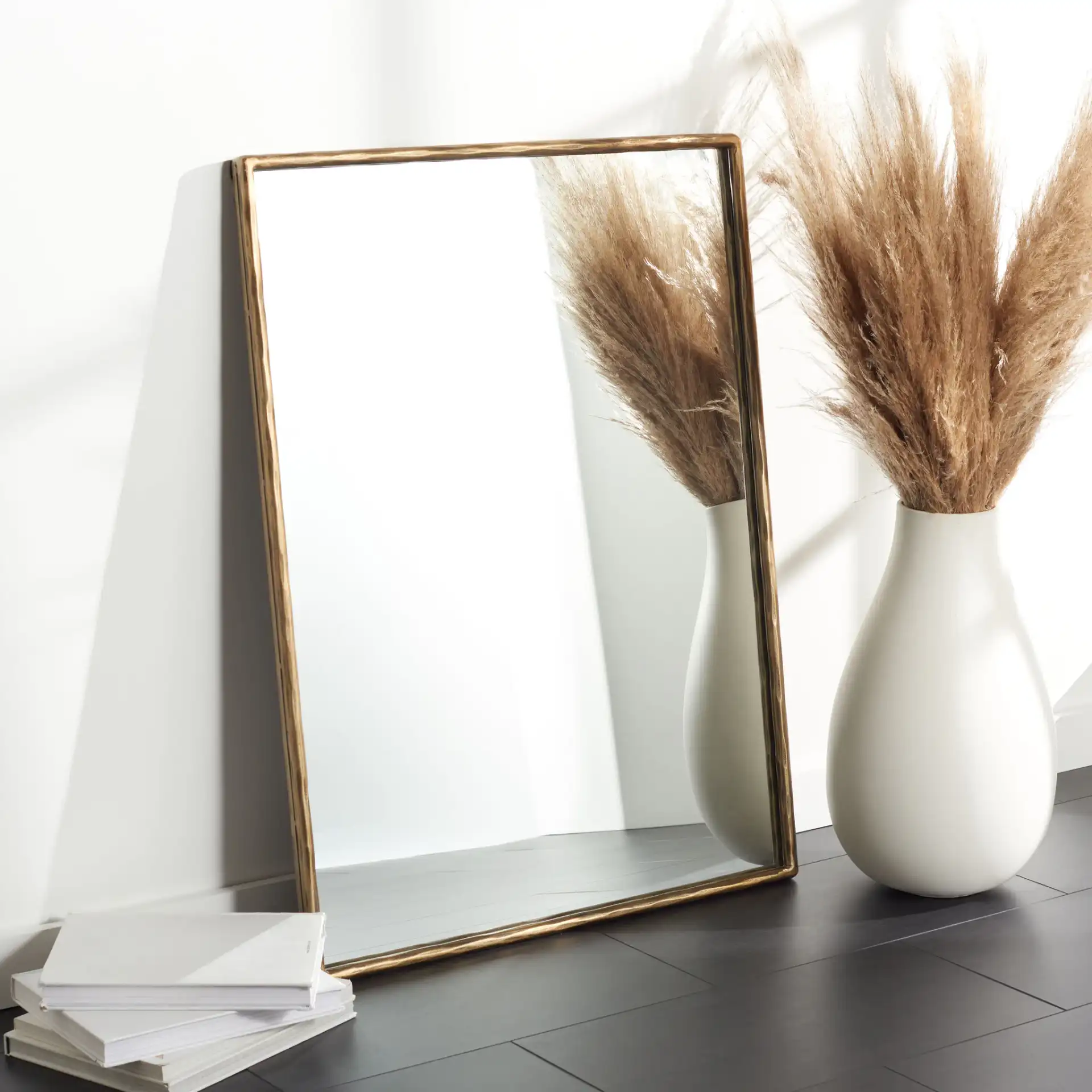 Jessa Small Rectangle Mirror in Brass in a styled room