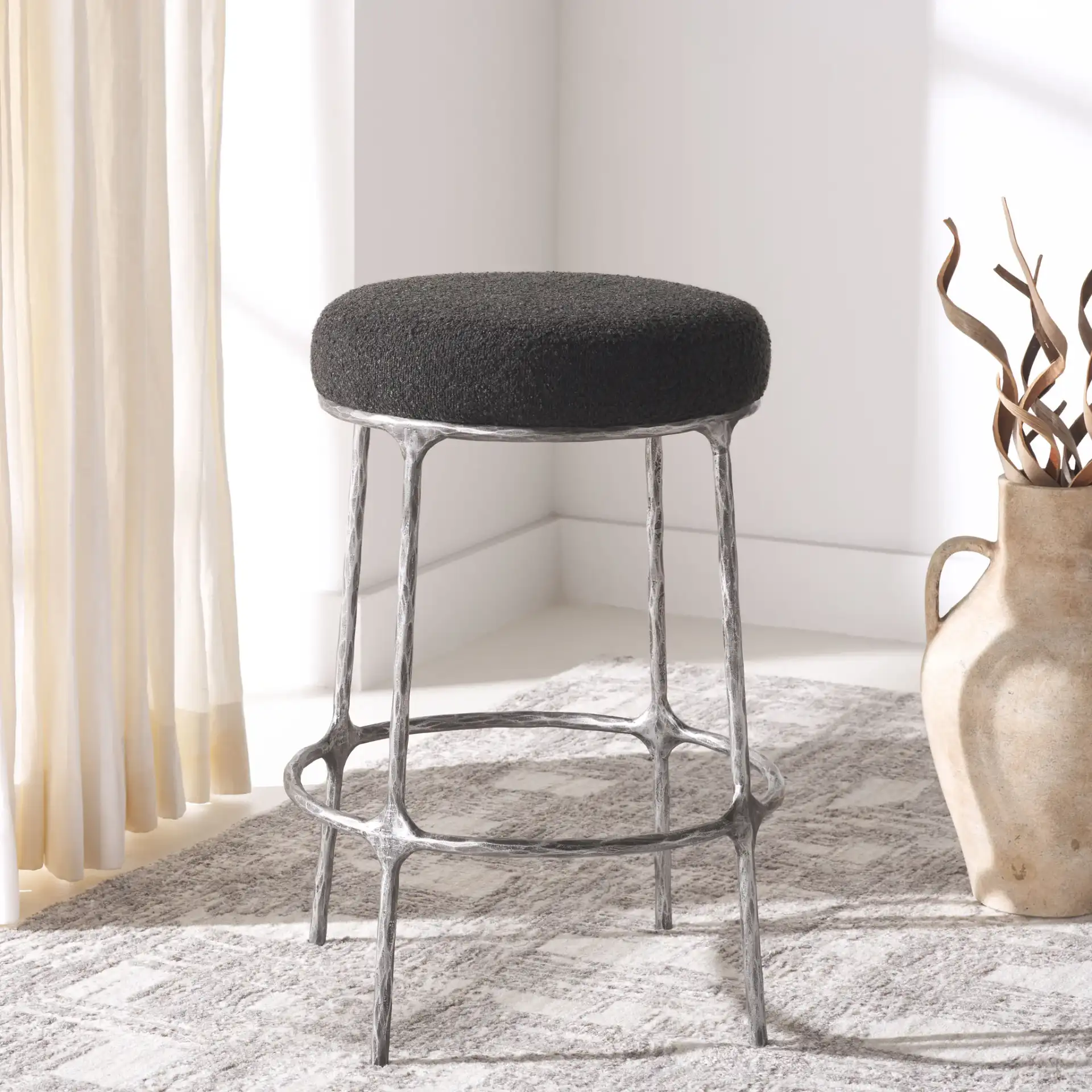 Trumen Boucle Counterstool in Black in a styled room