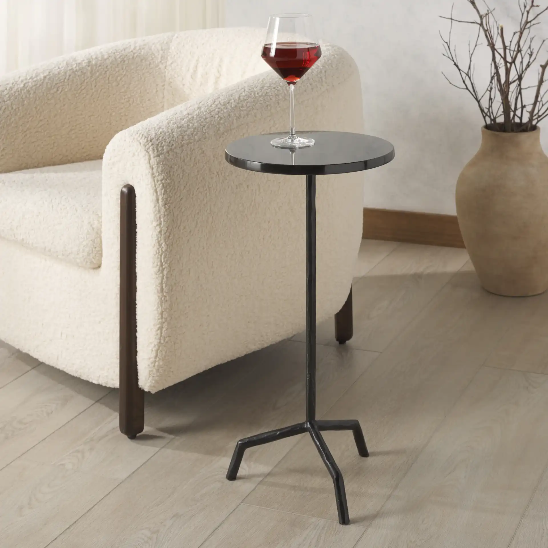 Fabrianna Marble Top Drink Table in Black in a styled room