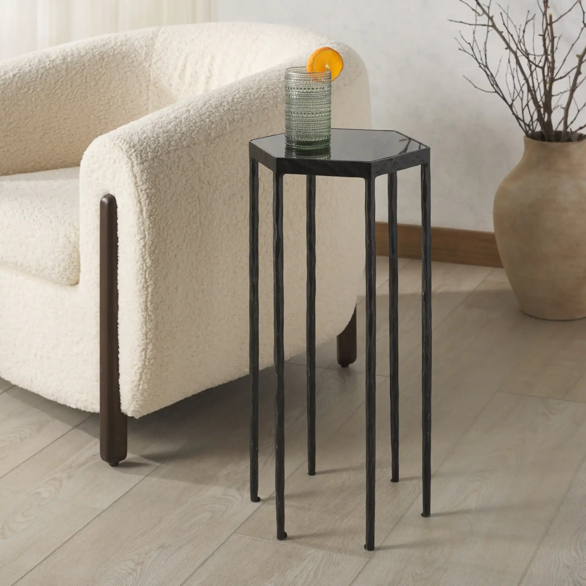 Galvin Marble Top Drink Table in Black in a styled room
