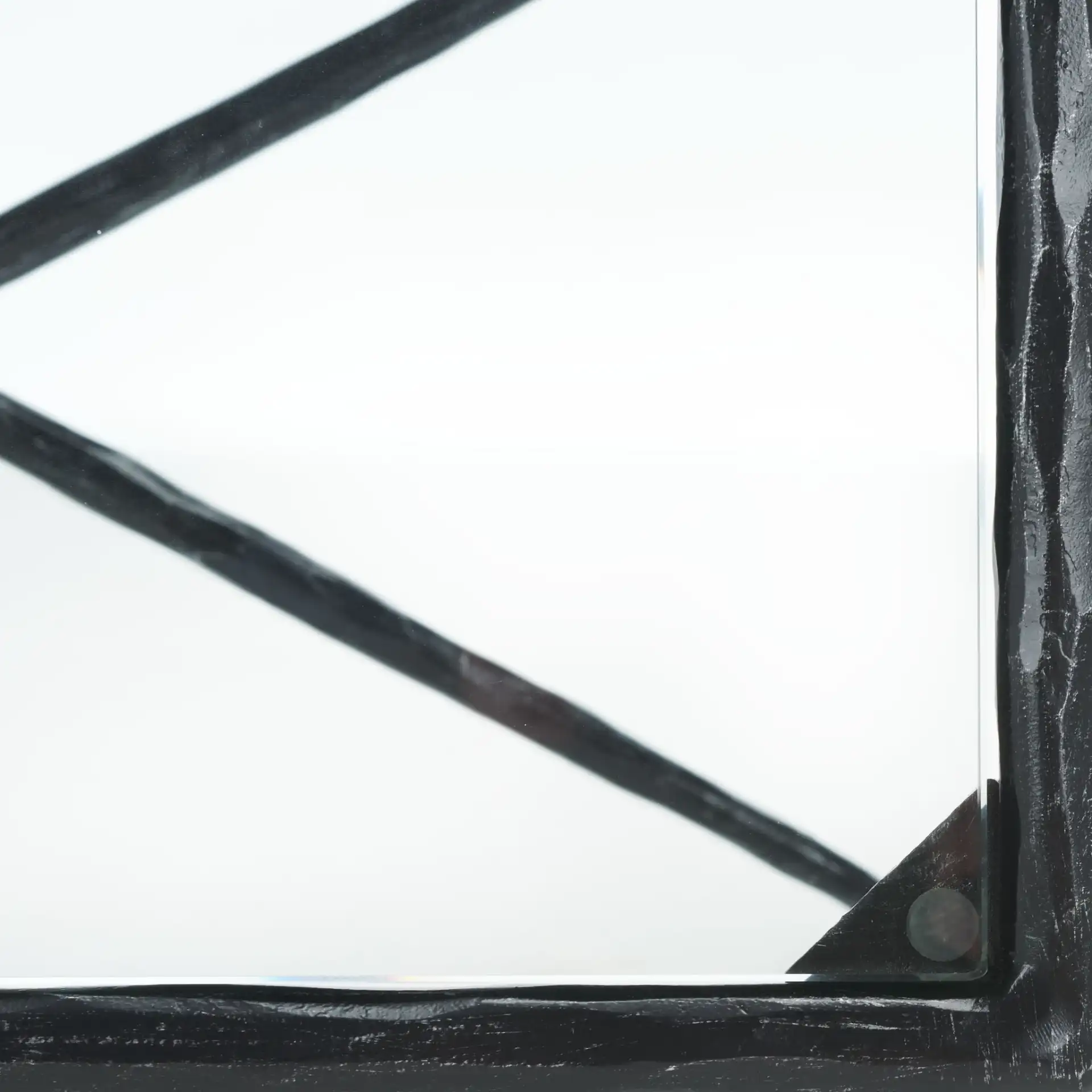 Isabellina Metal Accent Table in Black / Clear, detail view