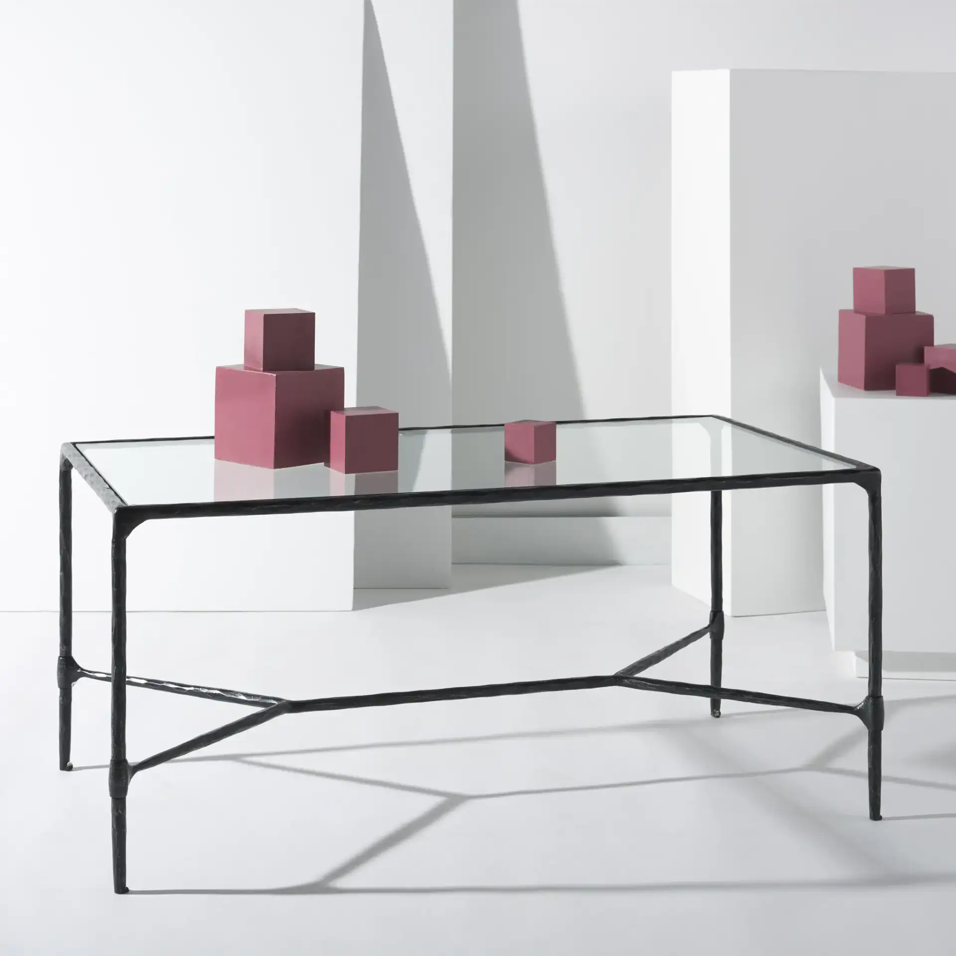 Isabellina Metal Coffee Table in Black / Clear in a styled room