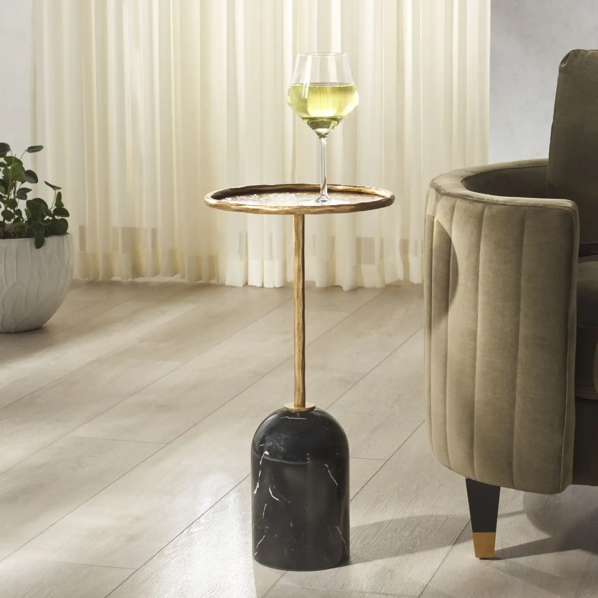 Tanyarose Metal Drink Table in Black in a styled room