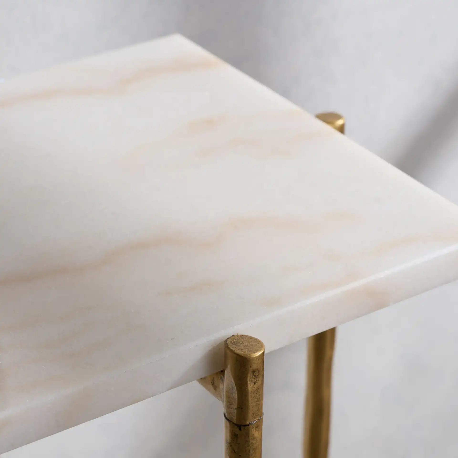 Giorgi Marble Top Console Table in Brass / White in a styled room