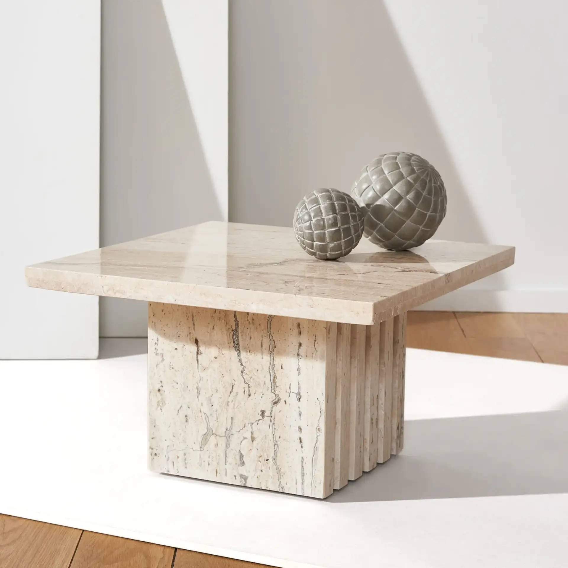 Olivia Square Travertine Accent Table in Brown in a styled room